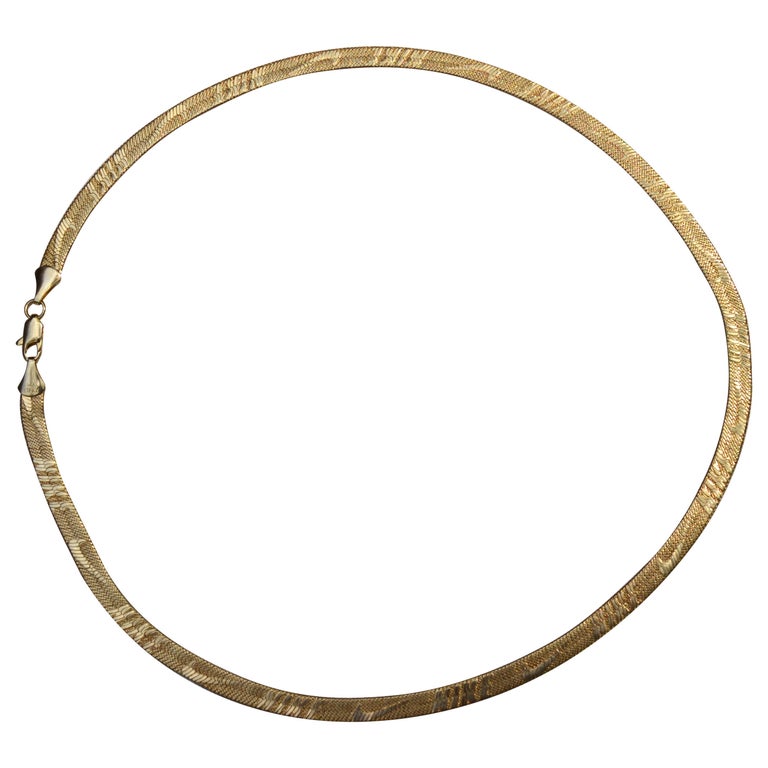 Vintage Nike Logo 14 Karat Gold Herringbone Chain Necklace at 1stDibs | nike  herringbone necklace, 14k gold nike necklace, nike gold chain