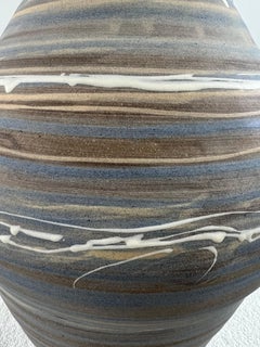 Vintage Handmade Pottery Vase with Blue & Earth-Tone Swirl Glaze