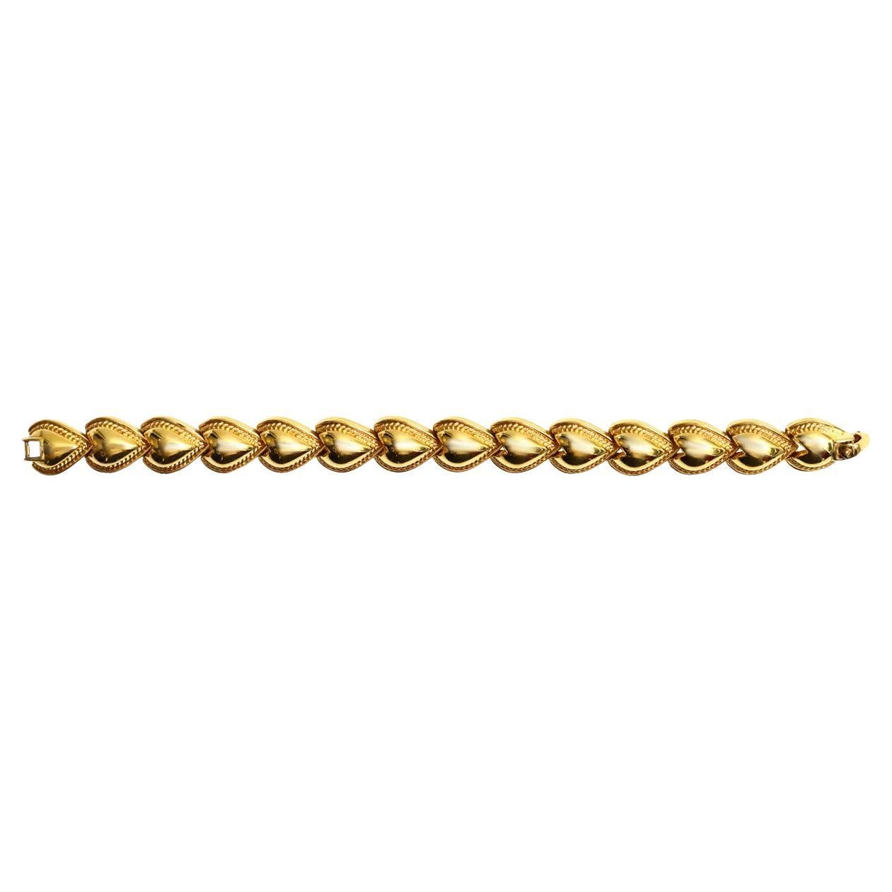 Women's or Men's Vintage Nina Ricci Gold Links of Heart Bracelet Circa 1980s For Sale