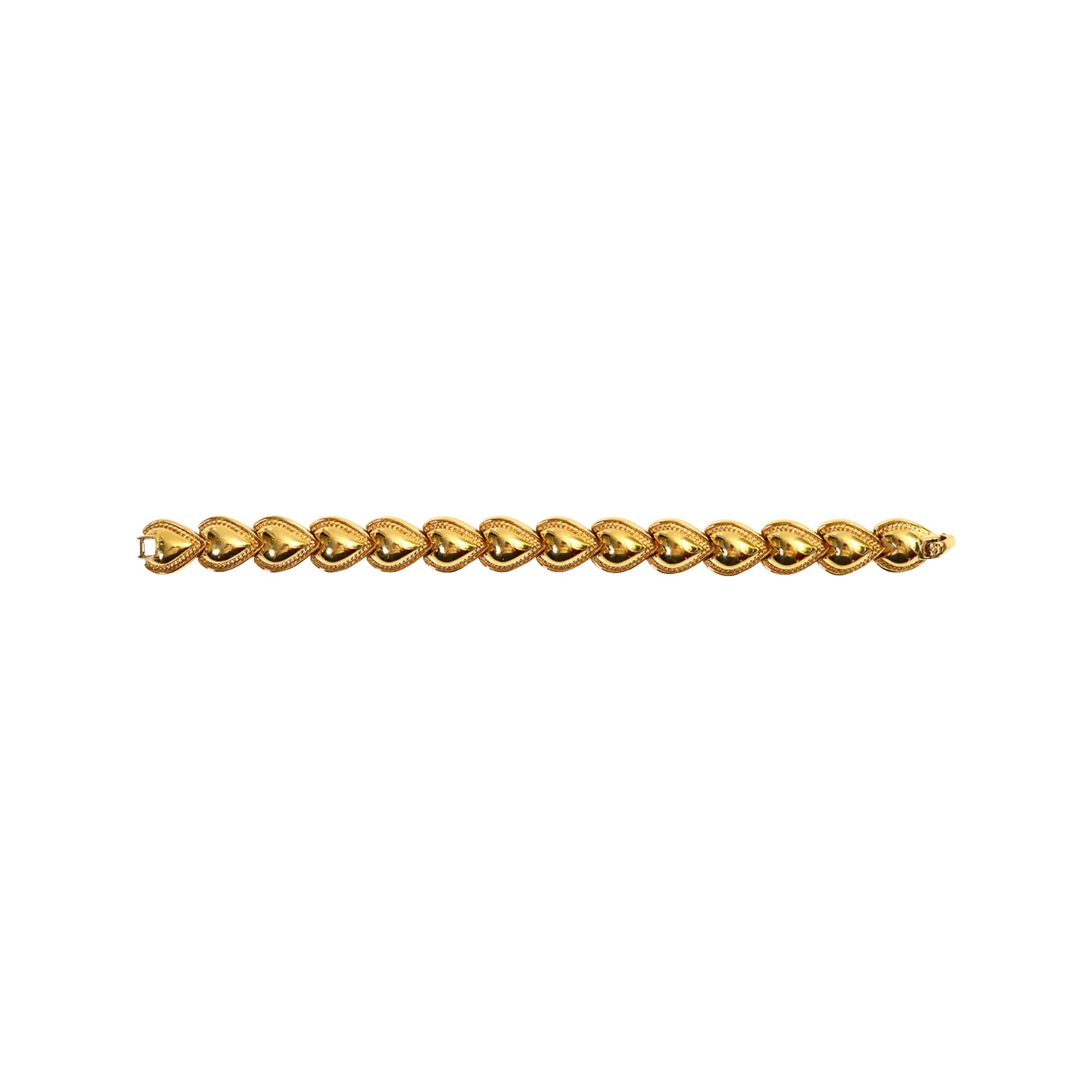 Vintage Nina Ricci Gold Links of Heart Bracelet Circa 1980 Unisexe en vente
