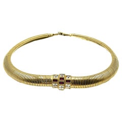 Collare Omega vintage Nina Ricci in oro e cristalli di rubino anni '80