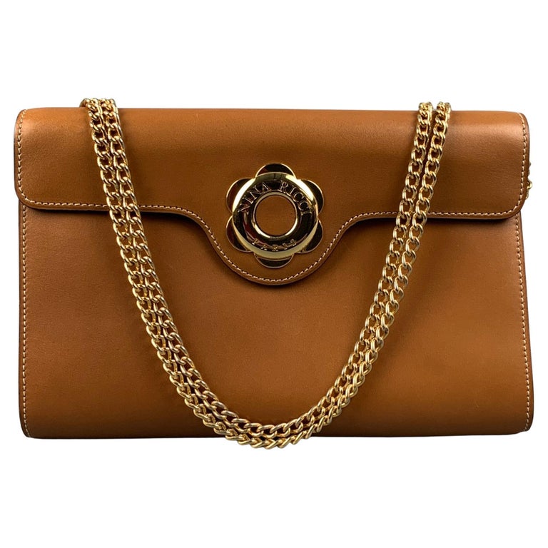 Vintage NINA RICCI Tan and Gold Contrast Stitch Leather Clutch Handbag For  Sale at 1stDibs