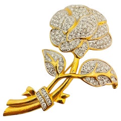 Broche de pasarela vintage NOLAN MILLER flor de strass dorado de diseño