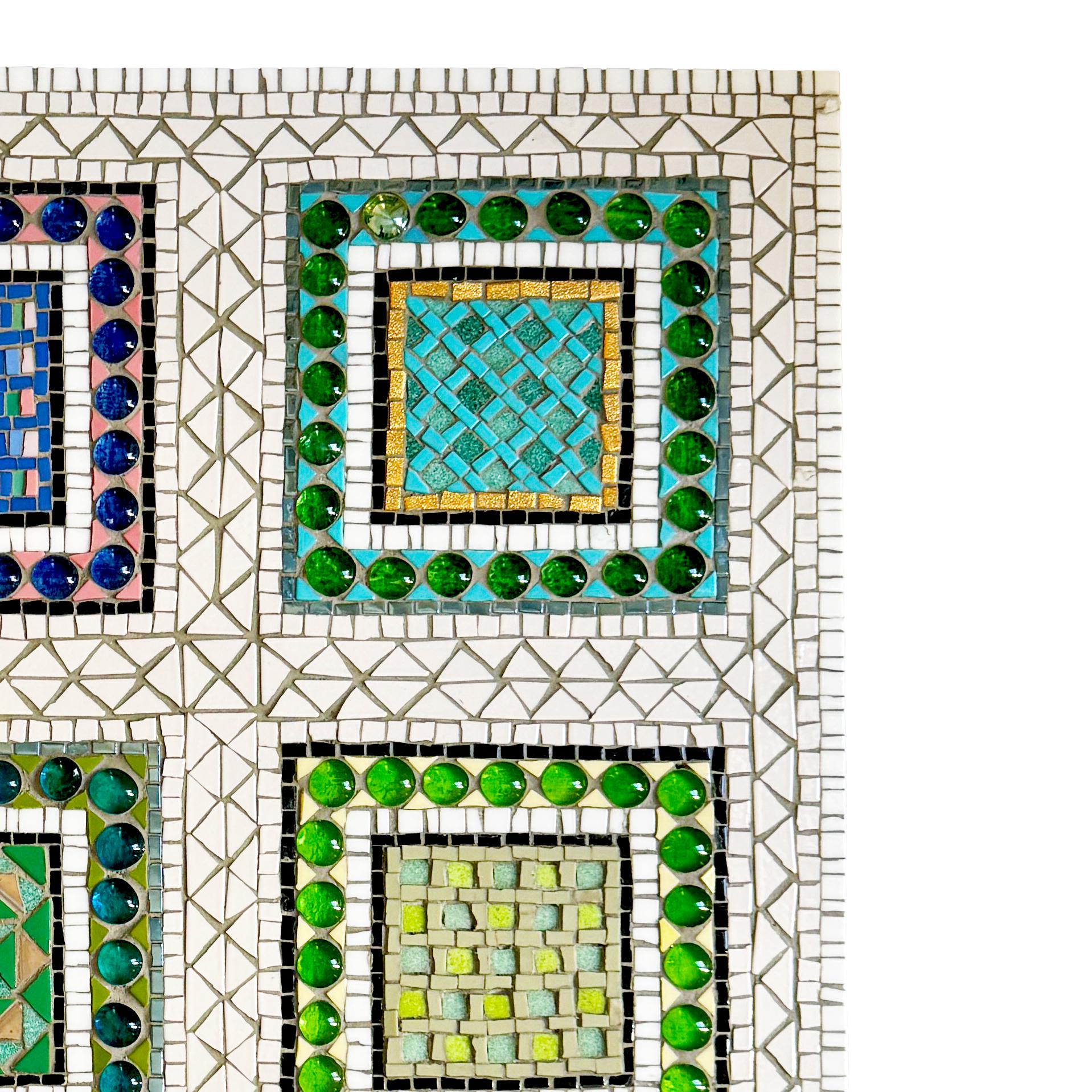 This eye-catching mosaic panel, masterfully crafted by French designer Norbert Seroussi, features a captivating arrangement of vibrant colorful polychrome squares, elegantly enclosed by intricate cabochons. Set against a pristine white background,