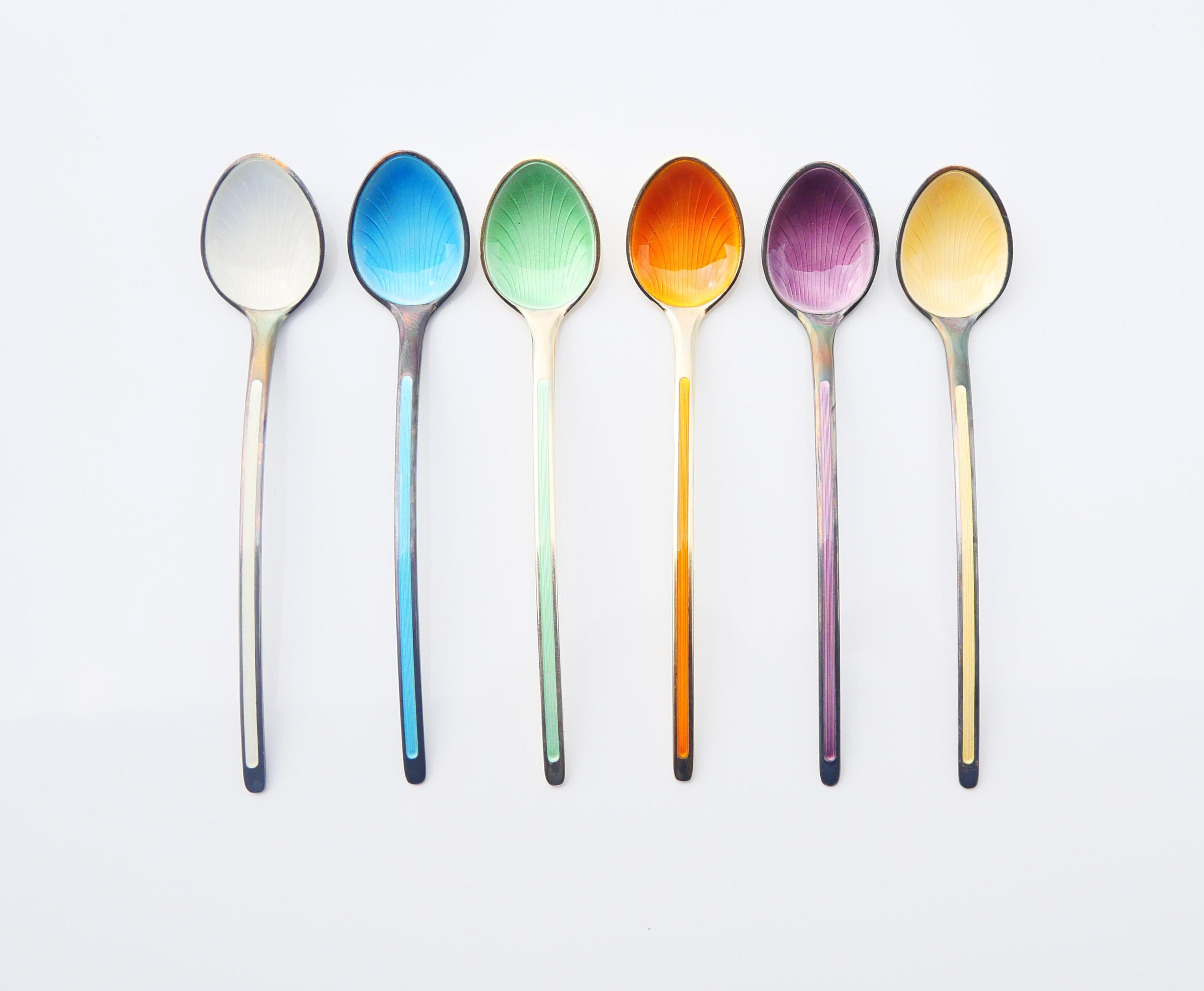 
Vintage set of fine tea/ ice - cream spoons solid Gilt 925 grade Silver decorated with translucent Guilloche Enamels.  Hand - made at the workshop of M.N Thune in Oslo, Norway ca 1960s. Hallmarked with maker's hallmarks that confirm solid 925 