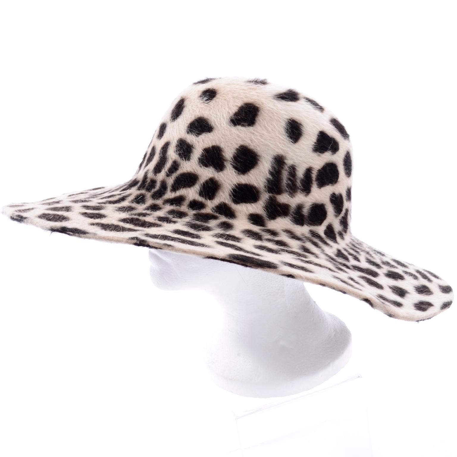 This is a beautiful vintage hat that was purchased at Nordstrom in the late 1980's or early 1990's.  The hat is made of rabbit fur in a cheetah print and was made in Italy.  We love hats and this one would be a great one to add to your
