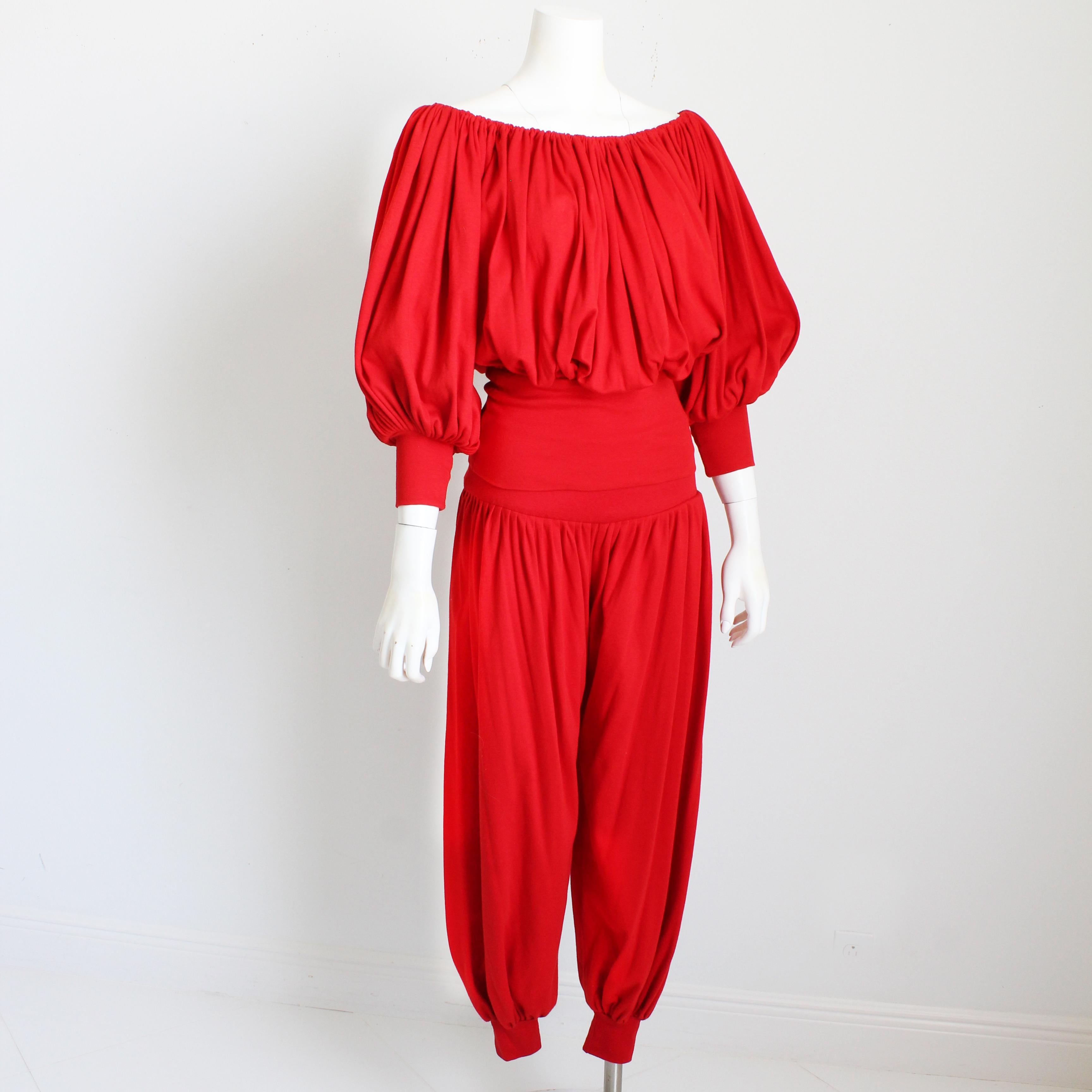 Preowned, vintage and incredibly rare Norma Kamali off shoulder top and harem pants set, likely made in the early 1980s.  This two-piece set includes an elasticized top, which can be worn on or off the shoulders and a pair of matching harem pants. 