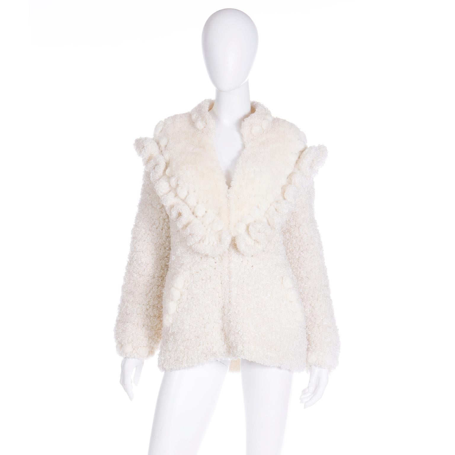 We love vintage sweaters and this fabulous vintage Norma of Canada chunky knit cream sweater is so unique and interesting! The sweater has various knit textures and weaves which creates an incredible amount of dimension and style. The sweater zips