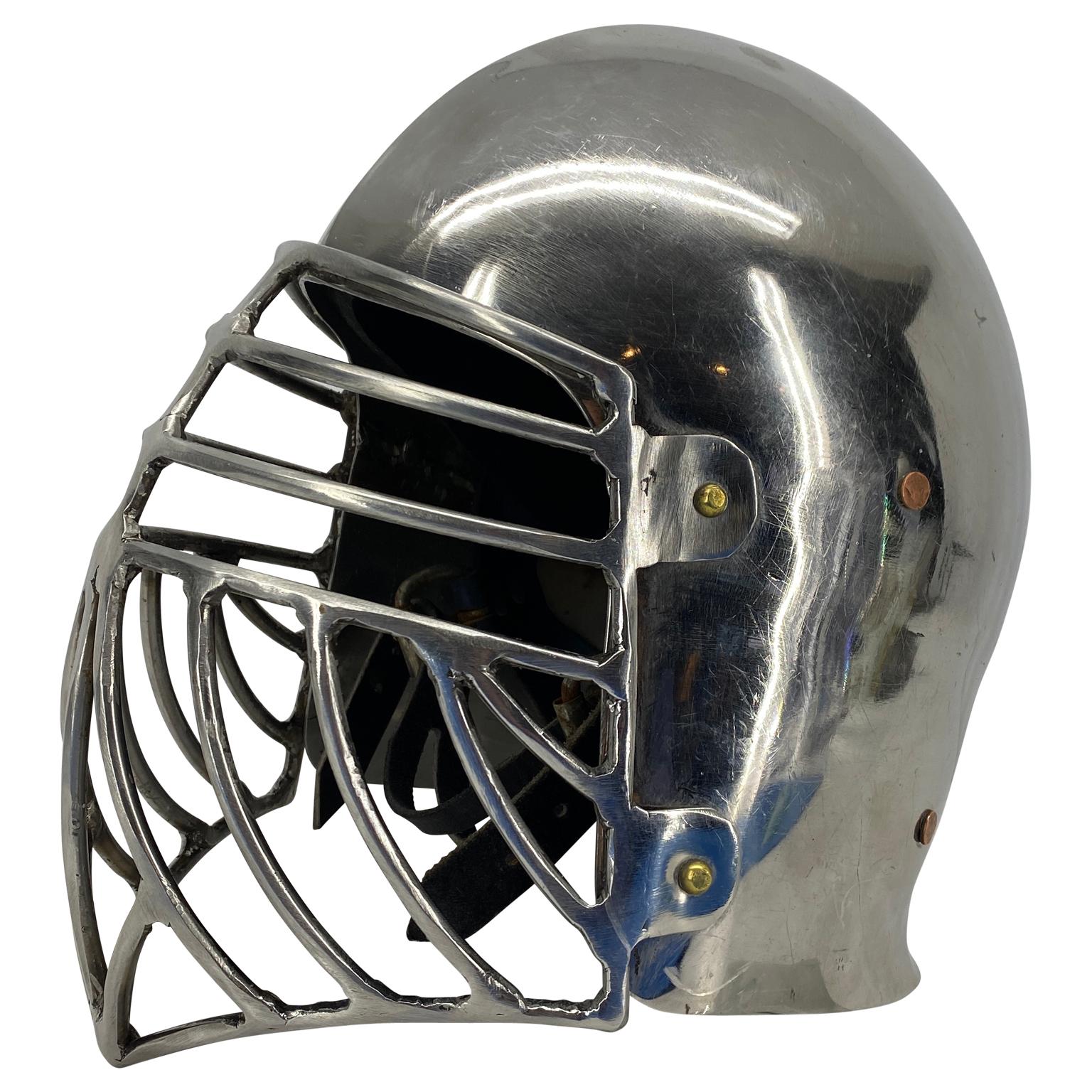 Post modern polished chrome Viking helmet.
The only known Viking helmet with the possibility of reconstruction was found in Norway. This great archeological find inspired the Norseman Helmet. This helmet covers the cheeks in addition to the eyes