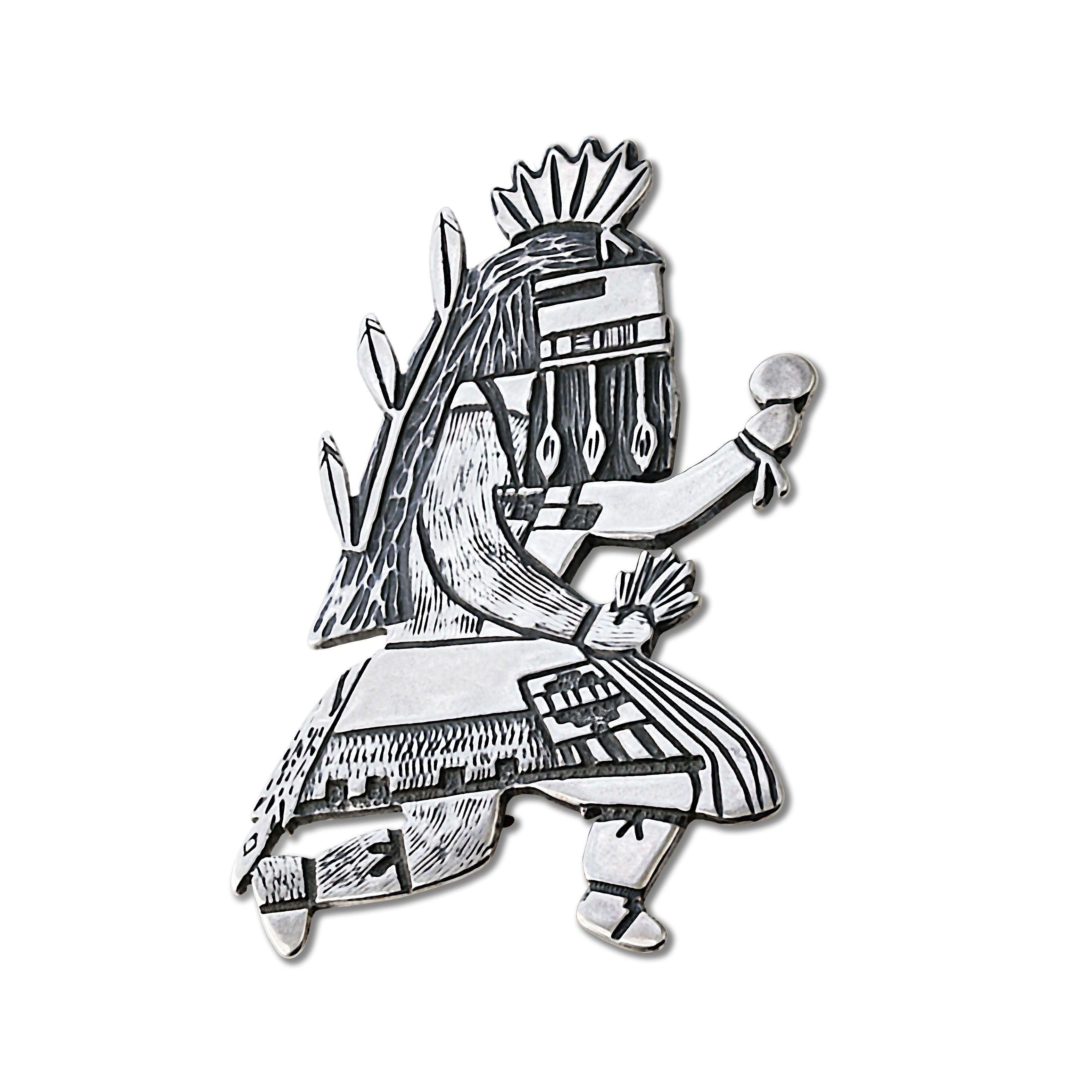 Vintage Mid Century Modern North American Navajo Decorative Sterling Silver Prayer Dancer Pendant Brooch Pin. The silversmith has created a somewhat Storyteller Prayer Dancer using decorative Embossed and Engraved techniques. The Prayer Dancer holds