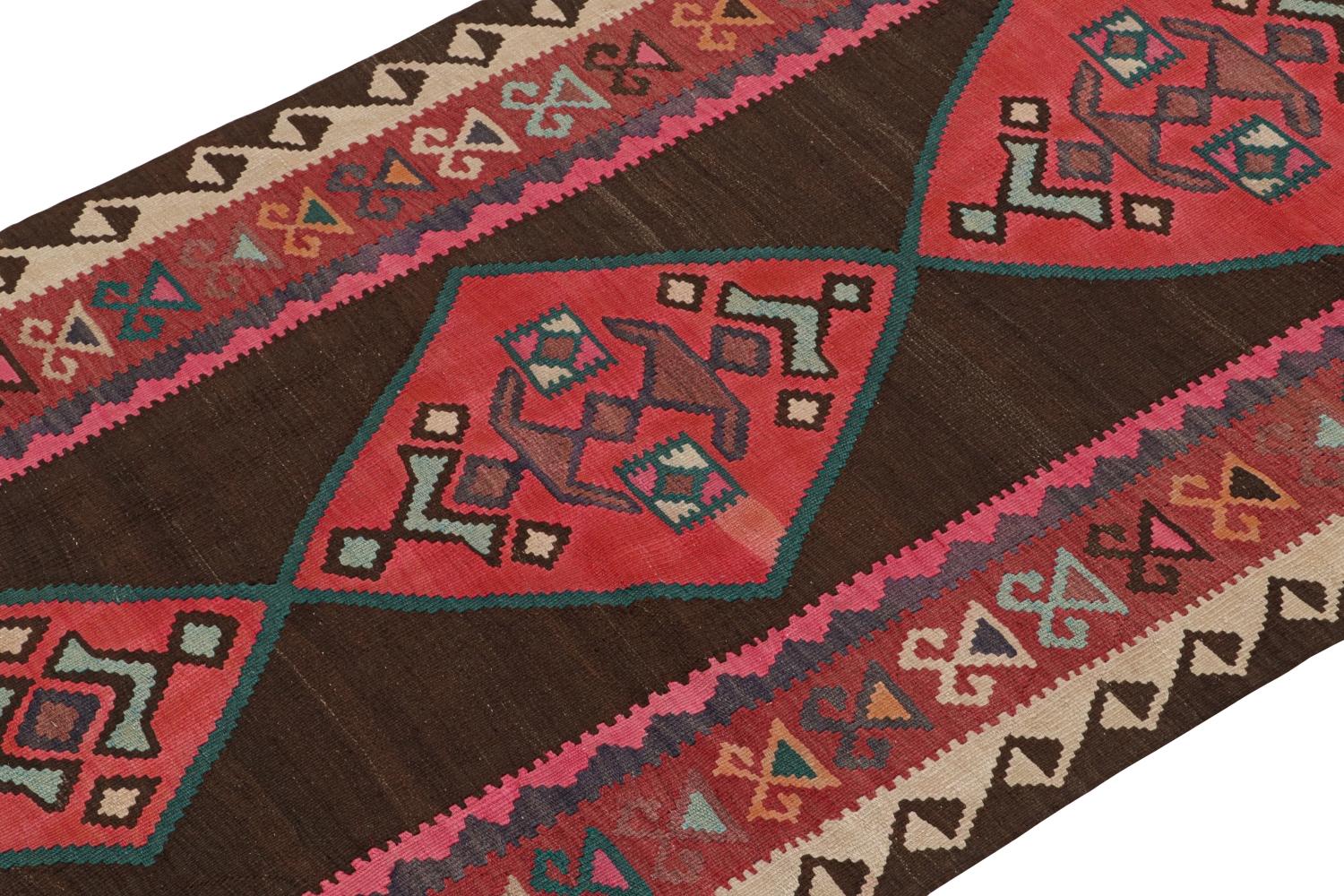 This vintage 4x9 Persian Kilim is a tribal rug from Meshkin—a small northwestern village known for its fabulous works. Handwoven in wool, it originates circa 1950-1960.

On the Design:

The classic design enjoys red medallions on a rich brown