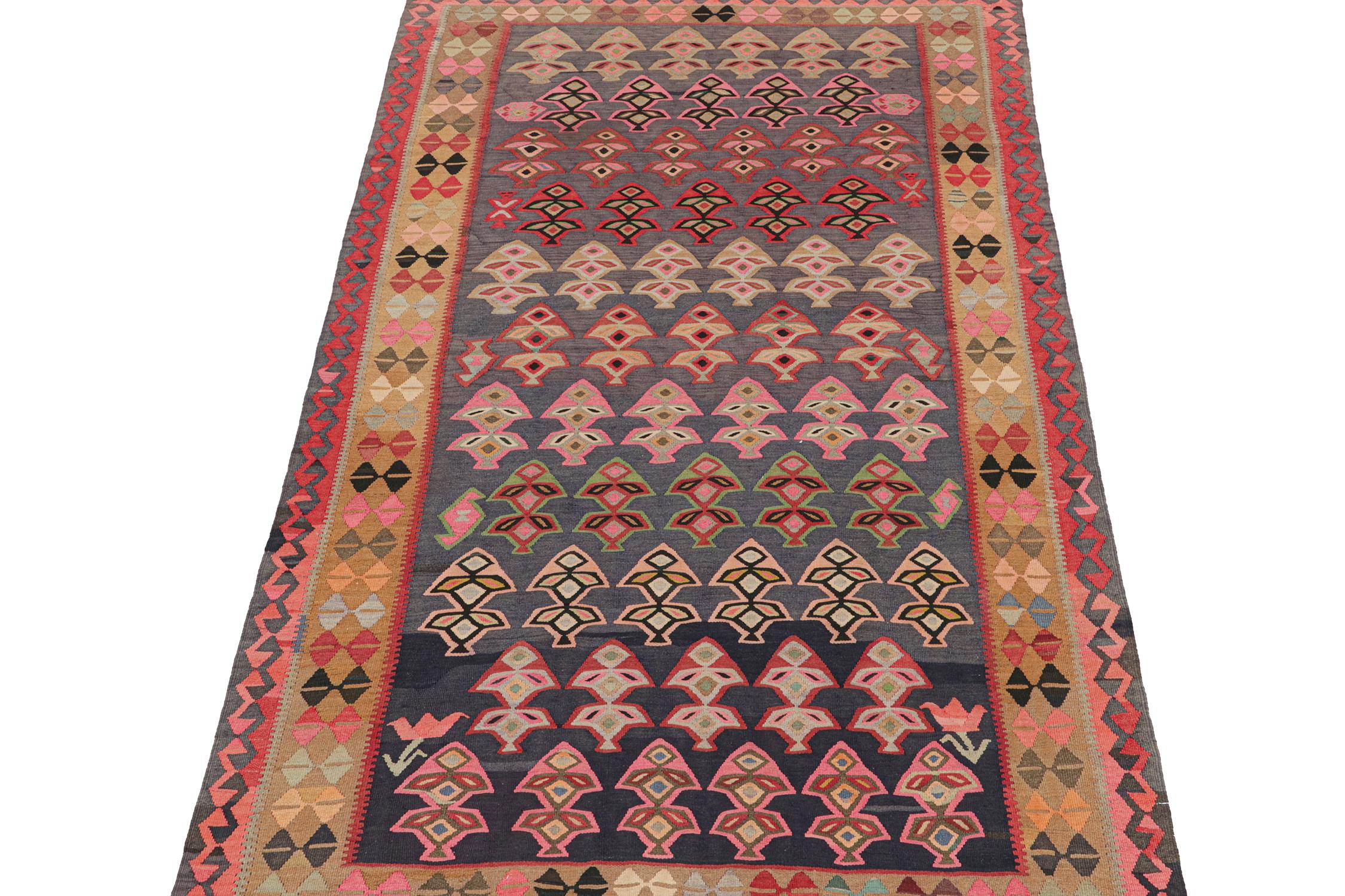This vintage 5x10 Persian Kilim is a tribal rug believed to hail from Meshkin—a small Iranian village known for its craft. Handwoven in wool circa 1950-1960, these are sometimes called Northwest designs—a well-known Persian provenance. 

Further on
