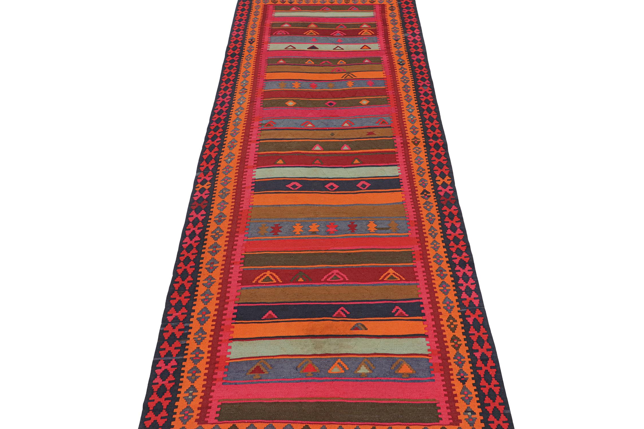 This vintage 5x14 Persian Kilim is handwoven in wool and originates circa 1950-1960. This Kilim is believed to hail from Meshkin—a small village known for its craft among what connoisseurs call 