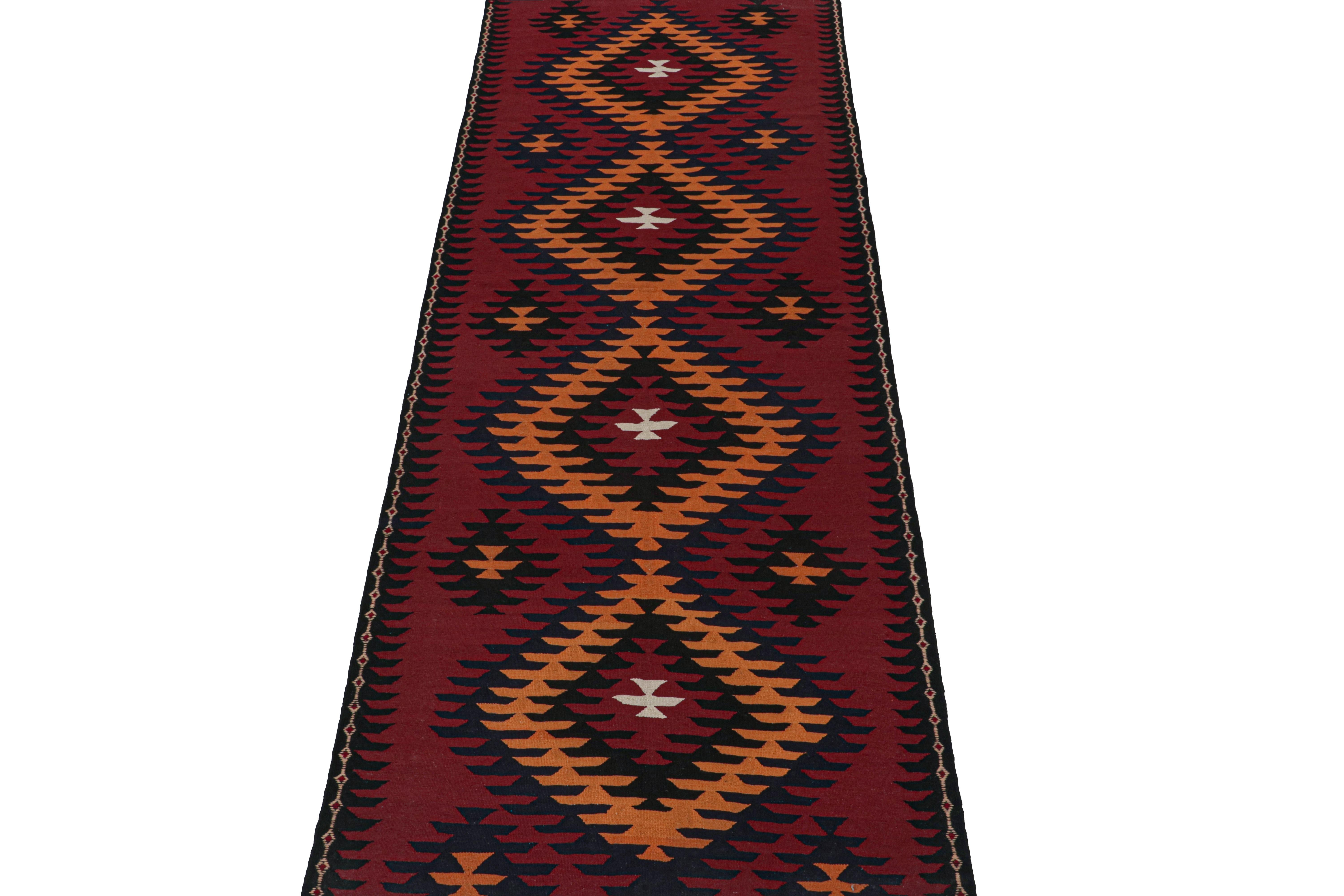 This vintage 5x14 Persian Kilim is believed to be a tribal gallery runner from Meshkin—a small Northwest 

Persian village known for its fabulous works. Handwoven in wool, it originates circa 1950-1960. 
Its design favors a clean approach to