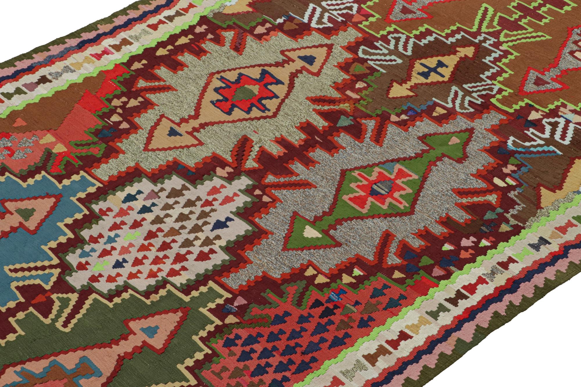 This vintage 5x10 Persian Kilim is a tribal rug from Meshkin—a small northwestern village known for its fabulous works. Handwoven in wool, it originates circa 1950-1960.

On the Design:

The bold design prefers tribal geometric patterns in