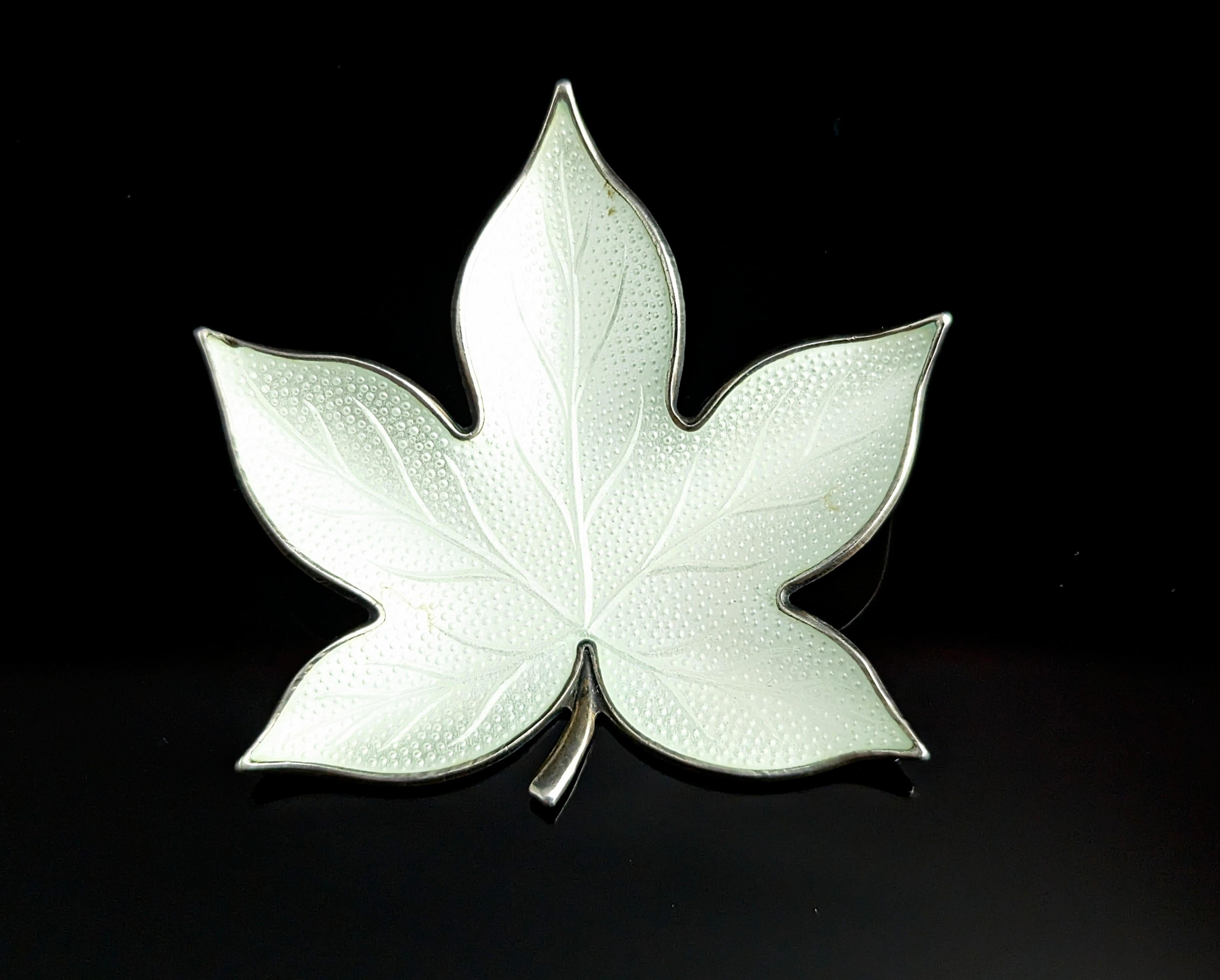 A beautiful and highly detailed vintage Norwegian sterling silver leaf brooch.

Very naturalistic design with smooth and textured areas, the fine enamel work really shines through on this piece and there is detailing upon detailing, it is a lovely