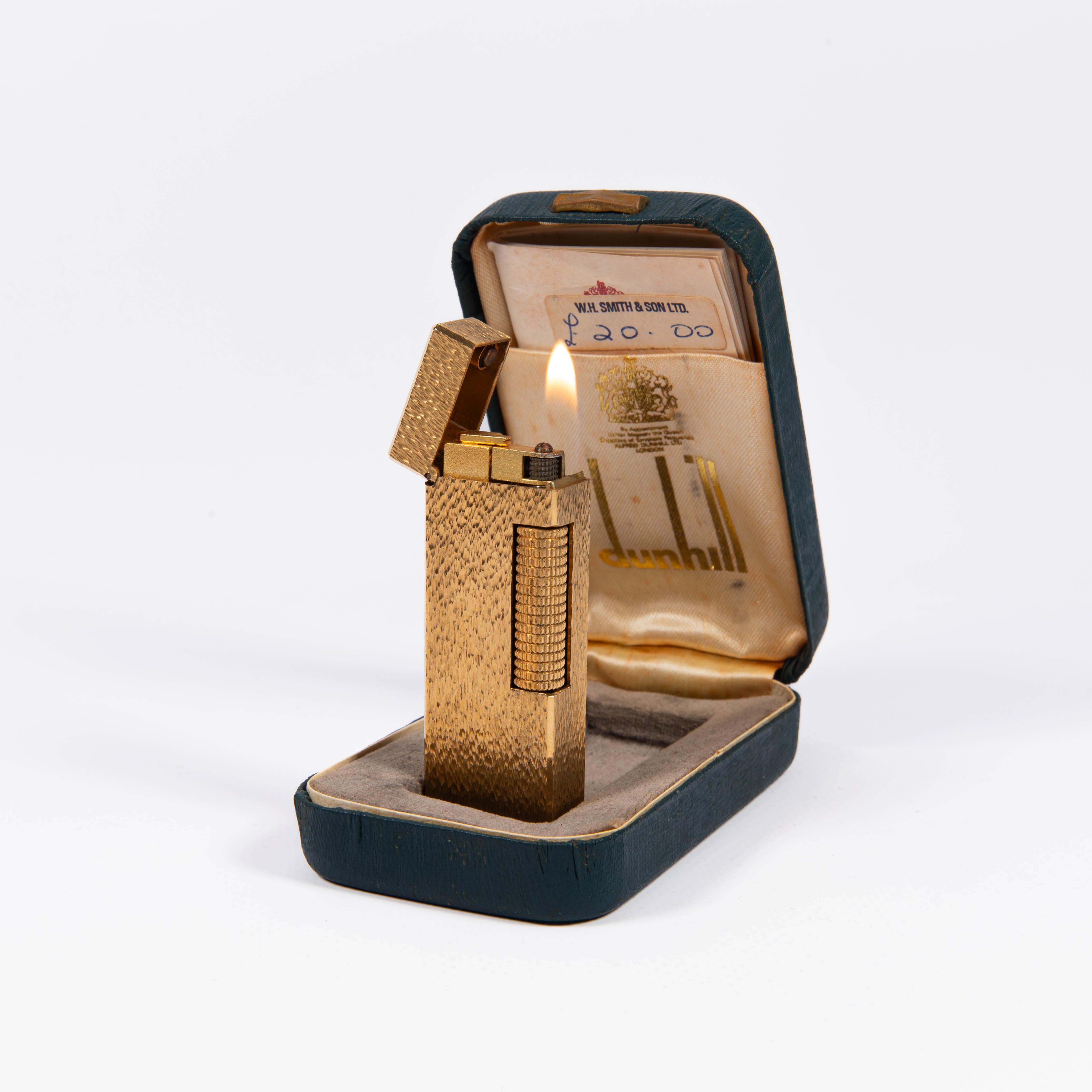 Vintage Dunhill Rollagas lighter Lapiz Lazuli Gold Plated In Box 1980s

The iconic Dunhill name is known for quality, well-made cigarette lighters and other smoking implements. The company’s origin can be traced to Alfred Dunhill opening his first