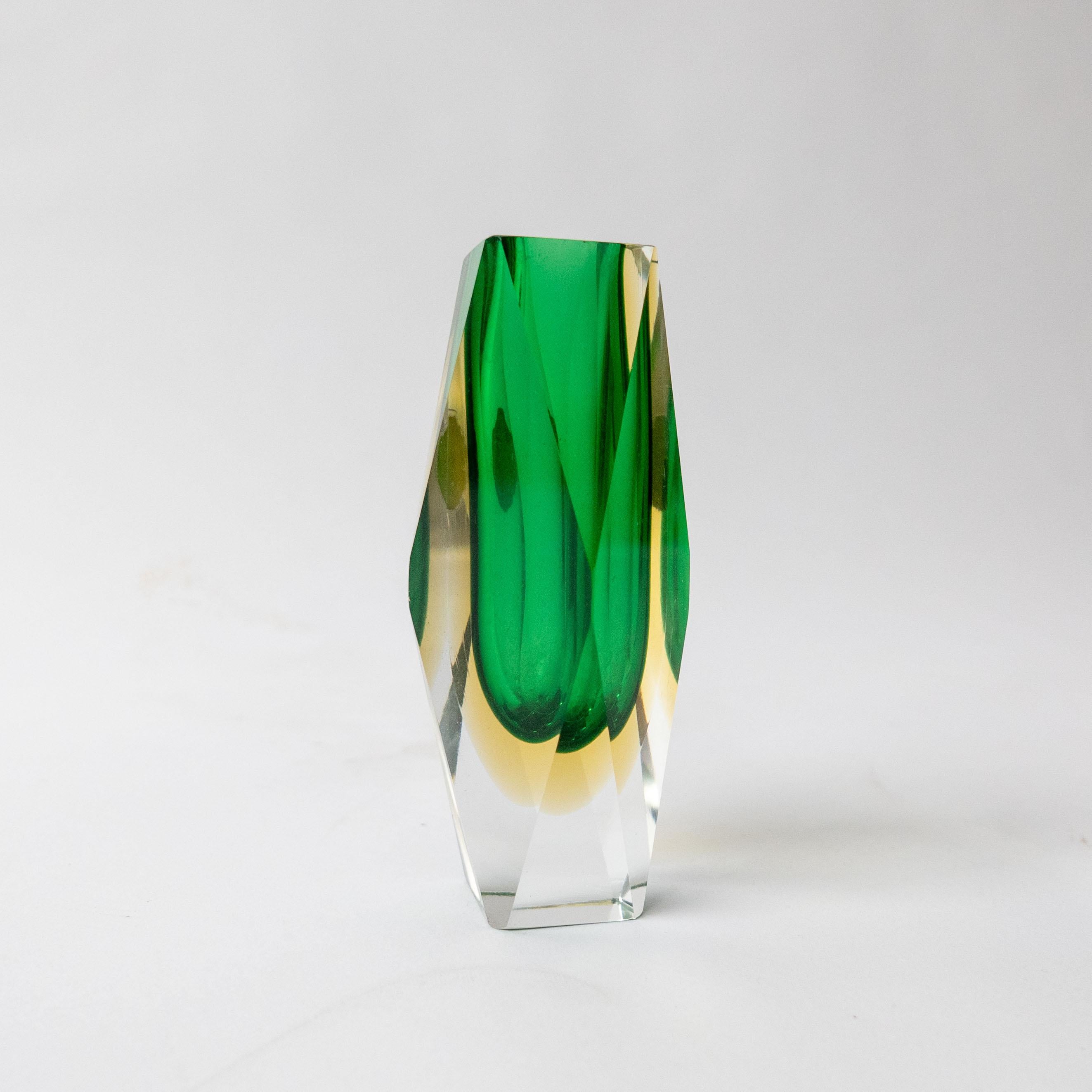 Universally regarded as one of the most prolific and capable designers of Murano glass vases and objects at large, Flavio Poli teamed up with some of the most influential and skilled glass producers of Murano to create timeless design pieces.