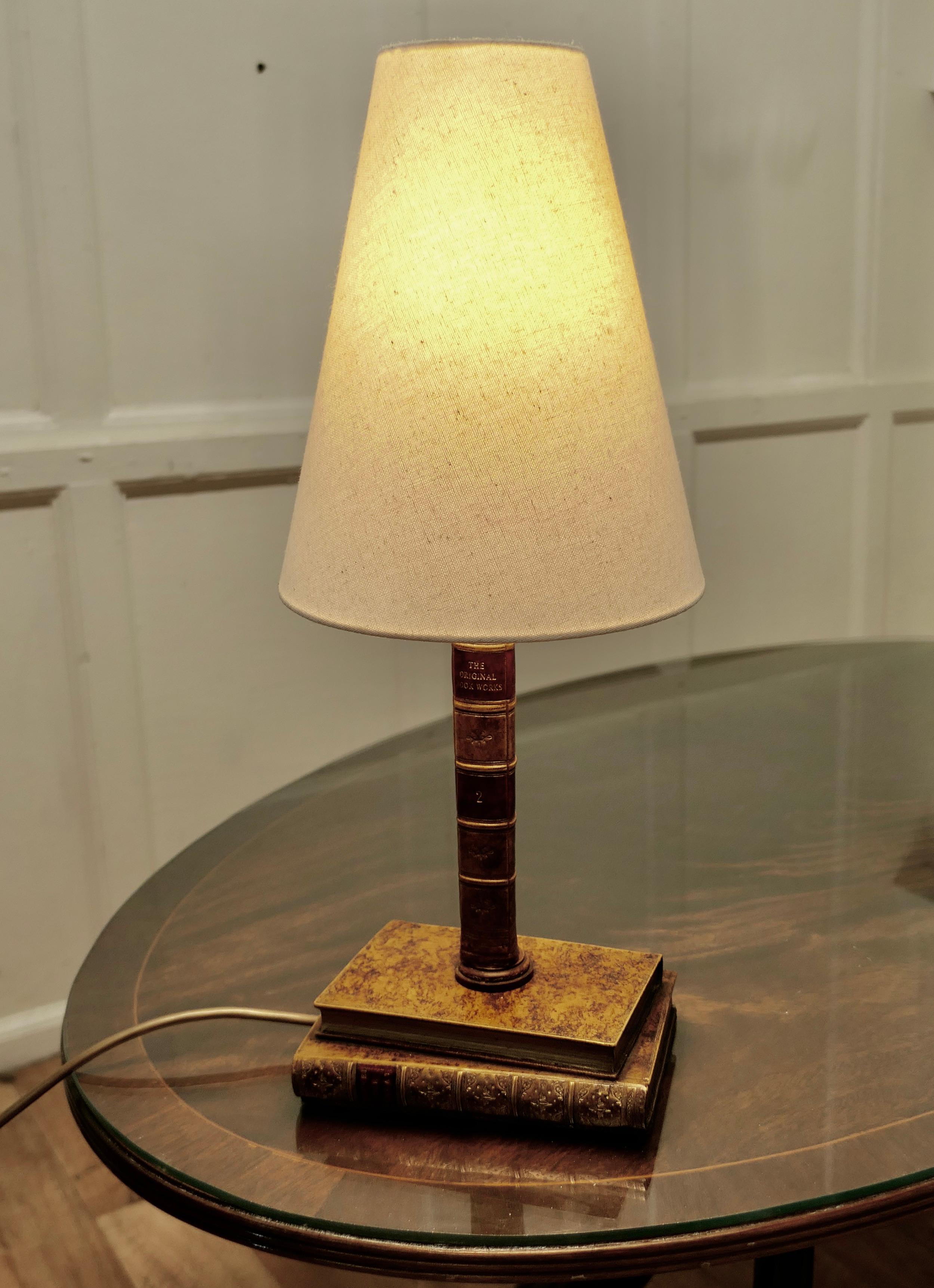 Vintage Novelty Ceramic Trompe-L’oeil desk lamp

The Lamp is made with ceramic leather book spines, a fun Trompe-L’oeil and a very attractive conversation piece. It is in good vintage condition

The lamp is 20” high including the shade and 8” x