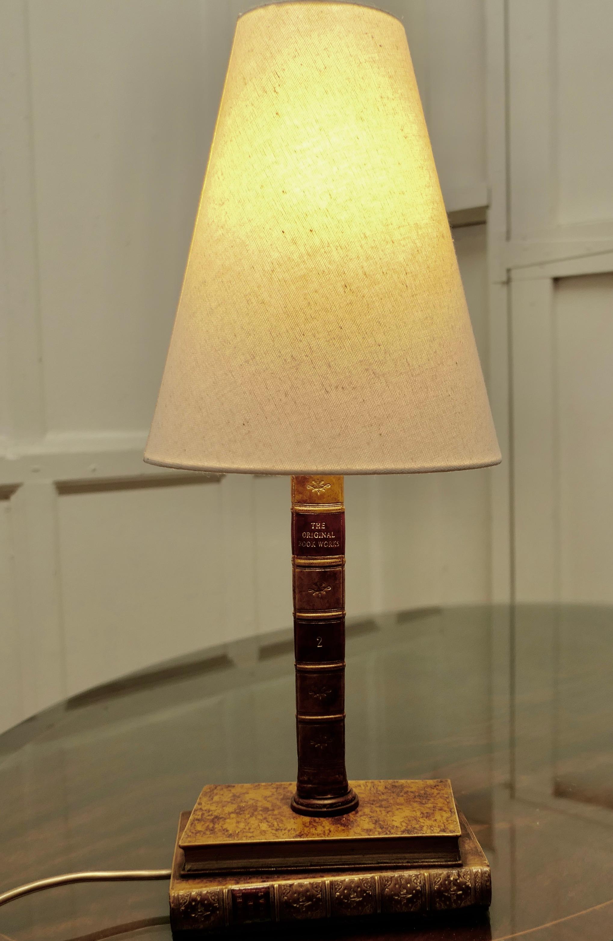 stacked books table lamp