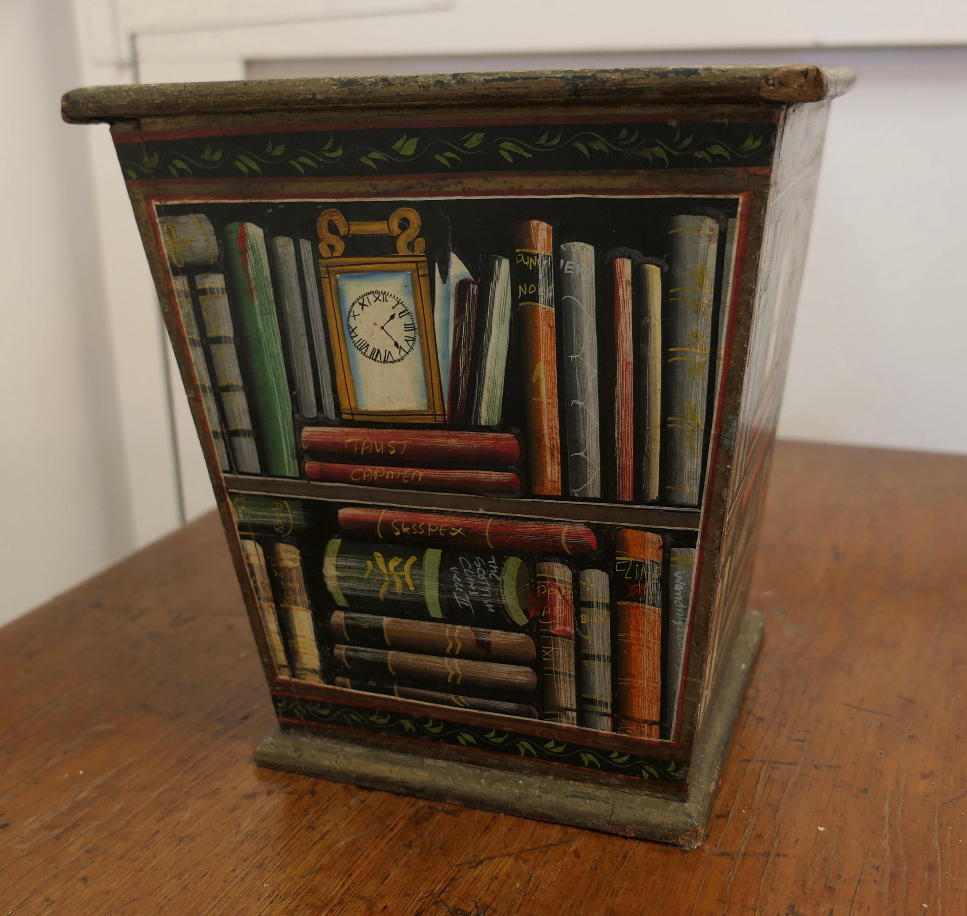 Vintage Novelty Waste Paper Basket

The container is made in wood with pictures of books and shelves on all 4 sides, a fun and a very attractive conversation piece

The container is 12” high and 10” across at the top
TMS184.