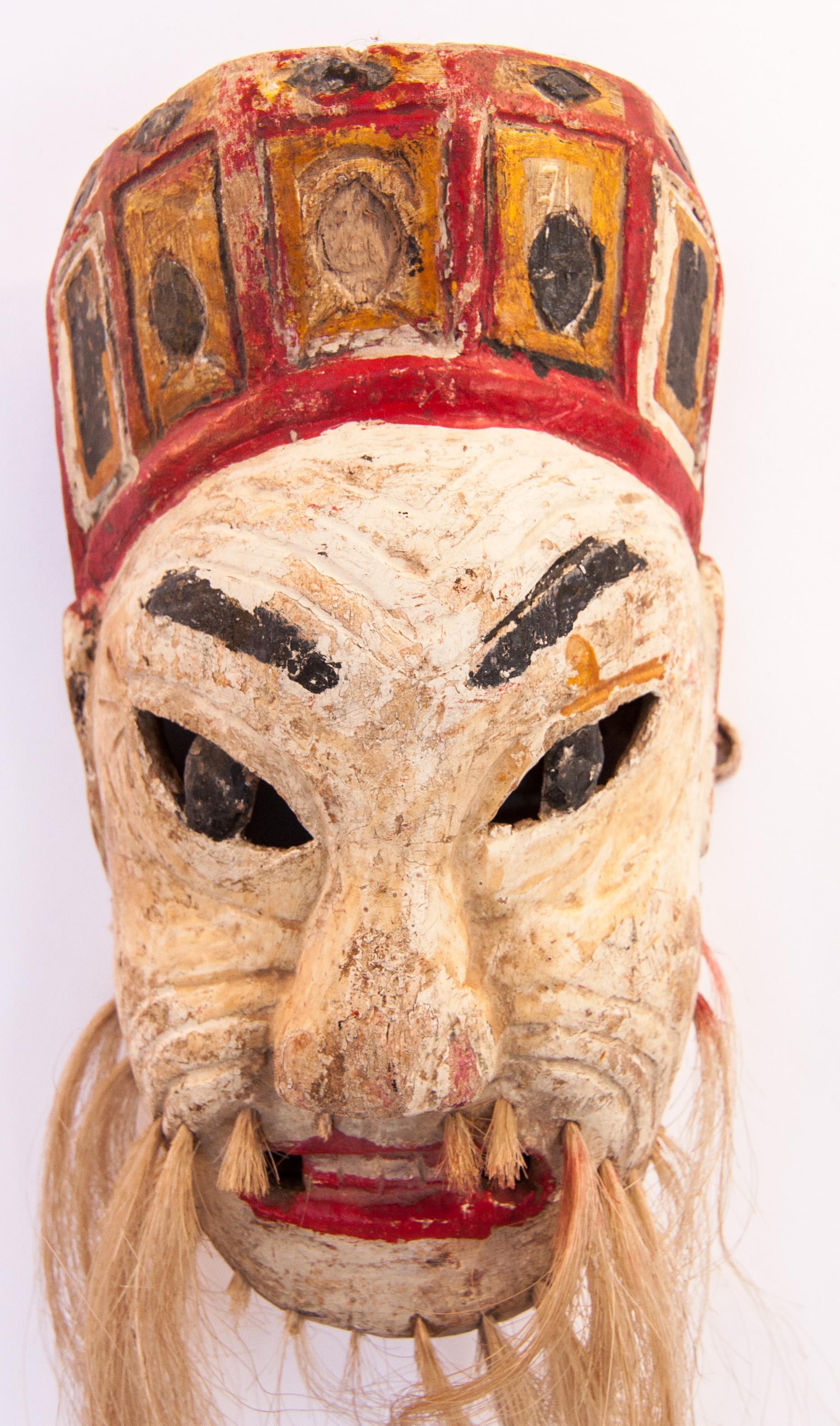 Vintage Nuo theater or ceremonial performance mask from Guizhou, South China, mid-20th century.
Nuo refers literally to a kind of exorcism, or driving out of spirits. Nuo theater and dance dramas were performed on the fourth day of the annual Nuo