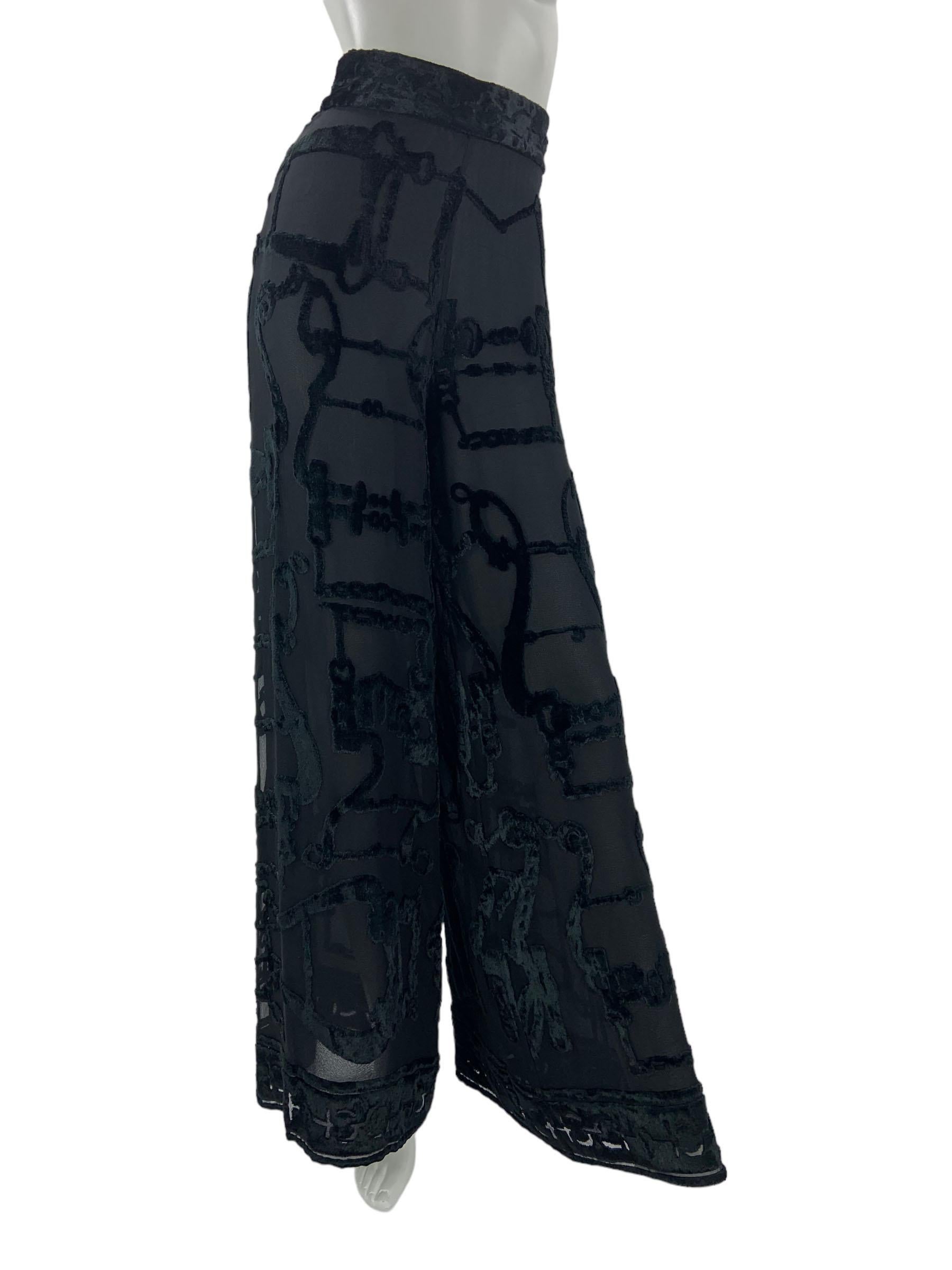 Super Rare and Brand New with Tag !!!
Gucci S/S 1993 Collection
Italian size - 40
Black Velvet and Silk Wide Leg Pants with Equestrian Design. 
Semi Seer Because of Fully Lined. If You Desire to Show Of Your Legs Lining Can be Deleted.
High Waisted,