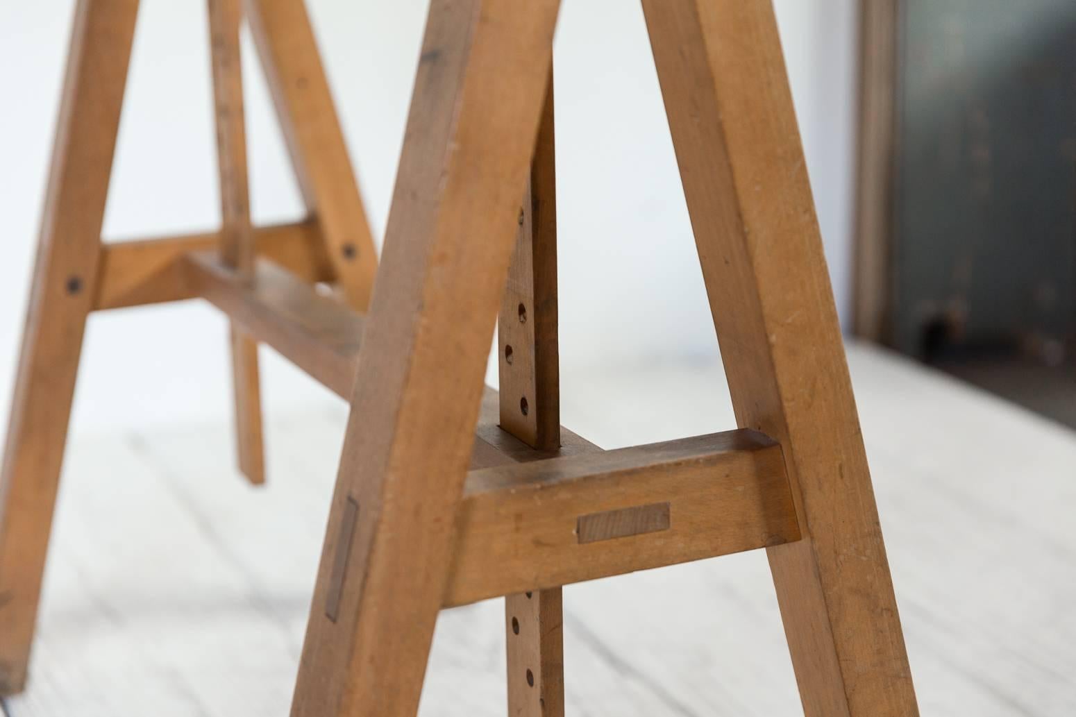 Vintage oak adjustable drafting work table desk with sawhorse base.