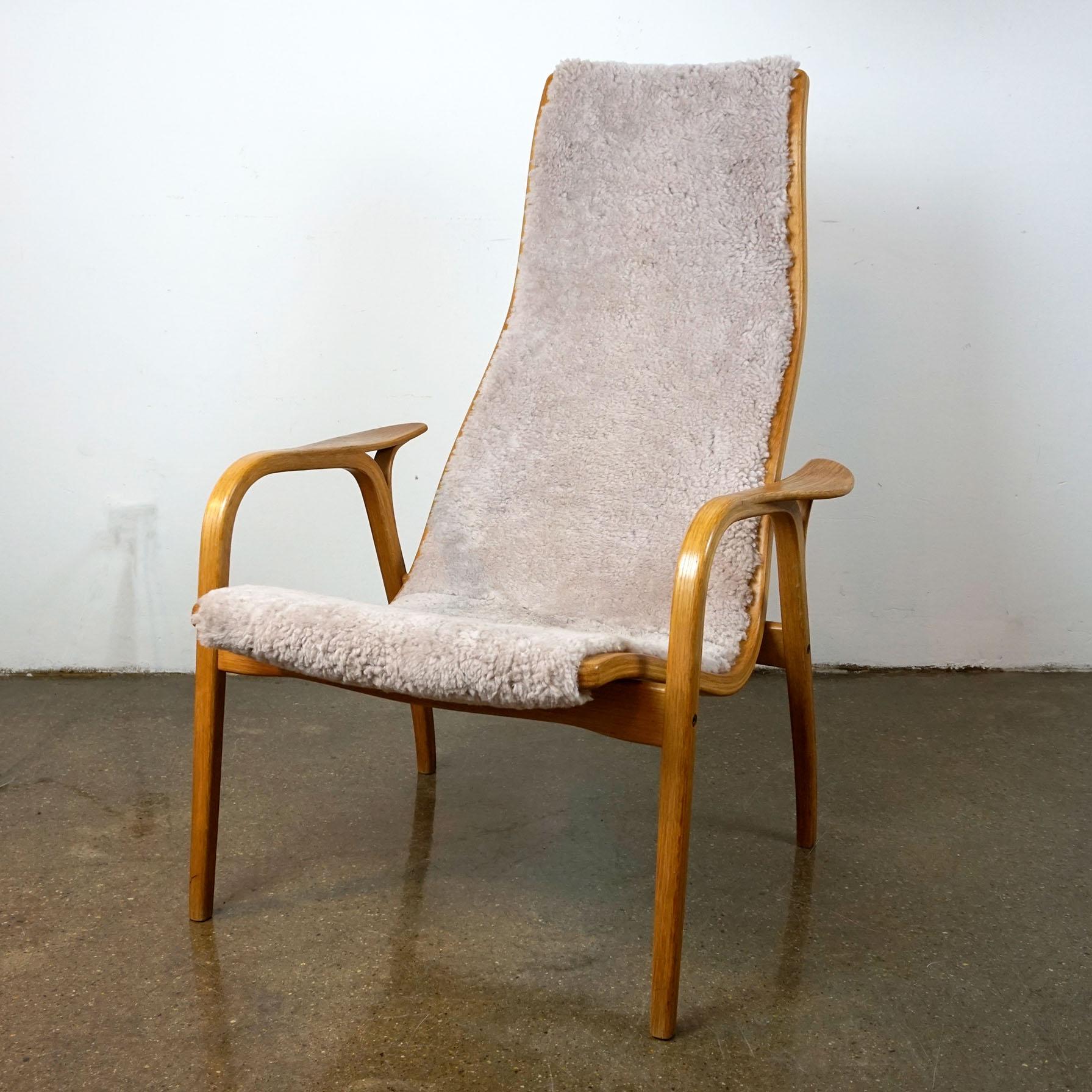 Ekströms Lamino chair, designed 1956, is one of the most comfortable chairs and a timeless sculptural Scandinavian design object. Natural Materials and excellent craftsmanship make it attractive for generations until now and into the future. It is a