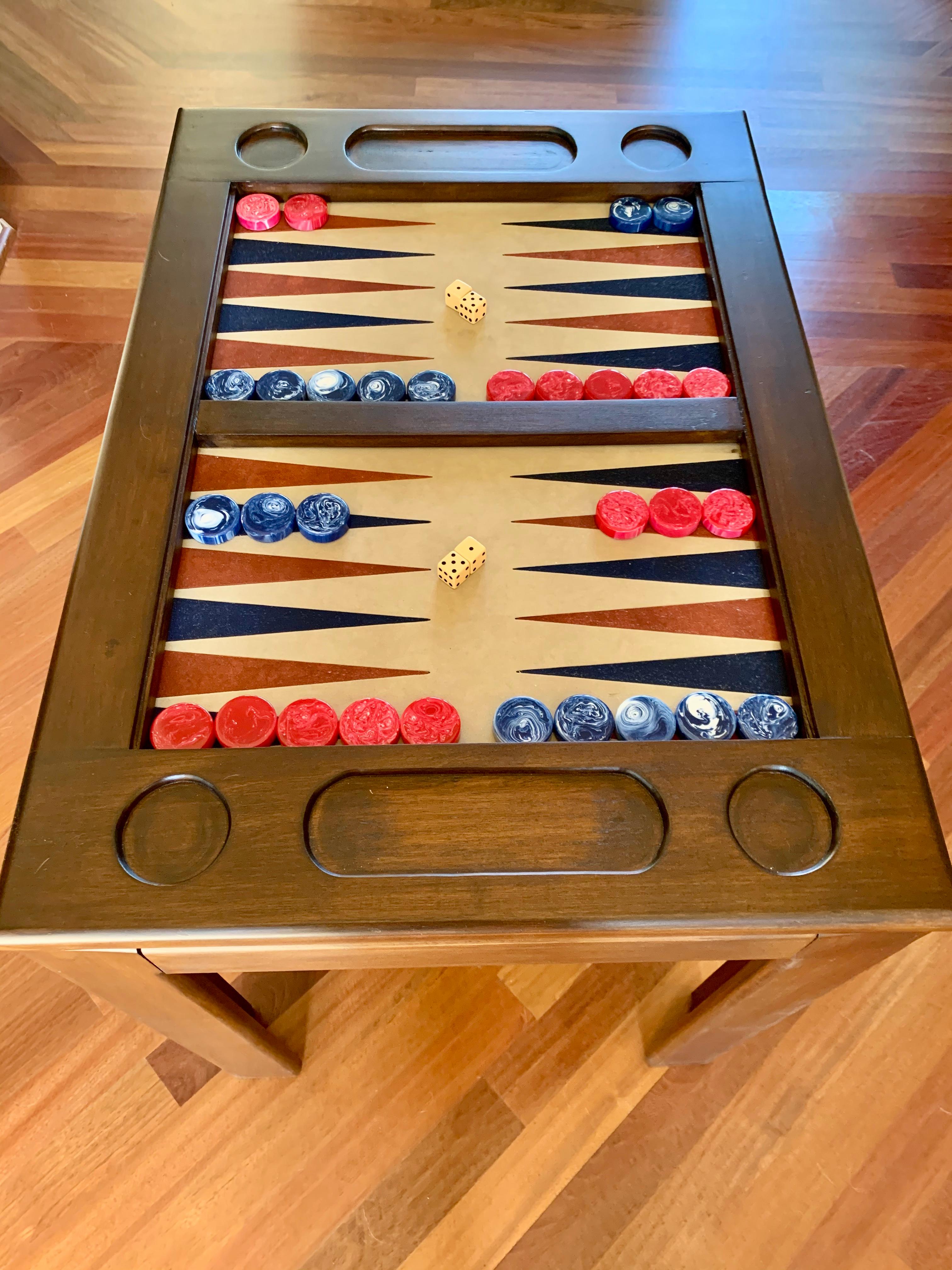 Classic oak backgammon table refinished in medium walnut. Suede game board with red and blue triangles. Custom glass top, bone dice and game pieces included with purchase. Great colors and the perfect scale for a game table.
