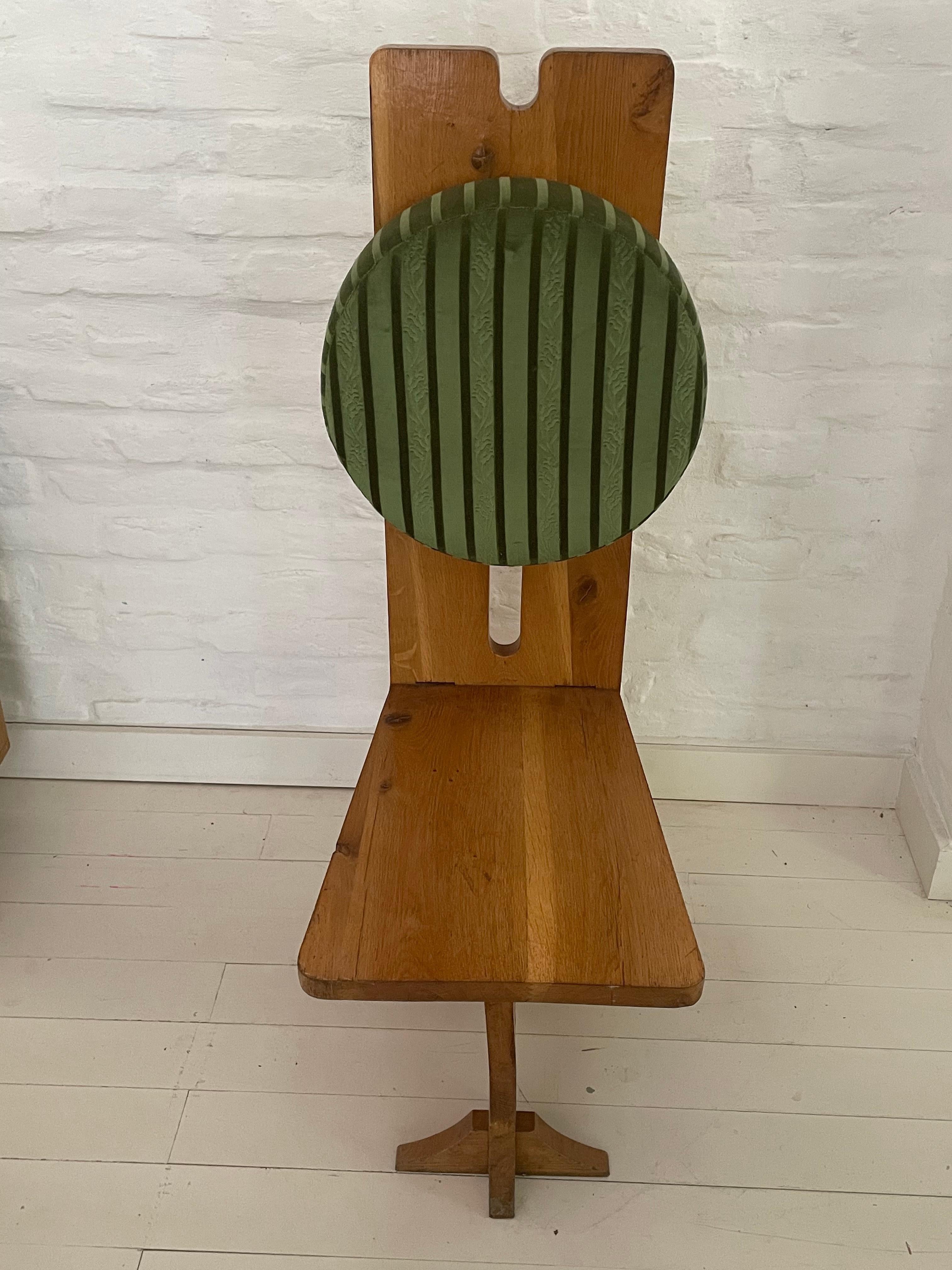 Unique high back chairs with geometrically shaped seat and backrest. Handcrafted and upholstered rest in an Arts & Crafts style.
The chair has authentic mortise and tenon joints and is tight and strong.
Overall, this rare chair has a great