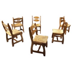 Used oak and wicker dining chairs, 1960s