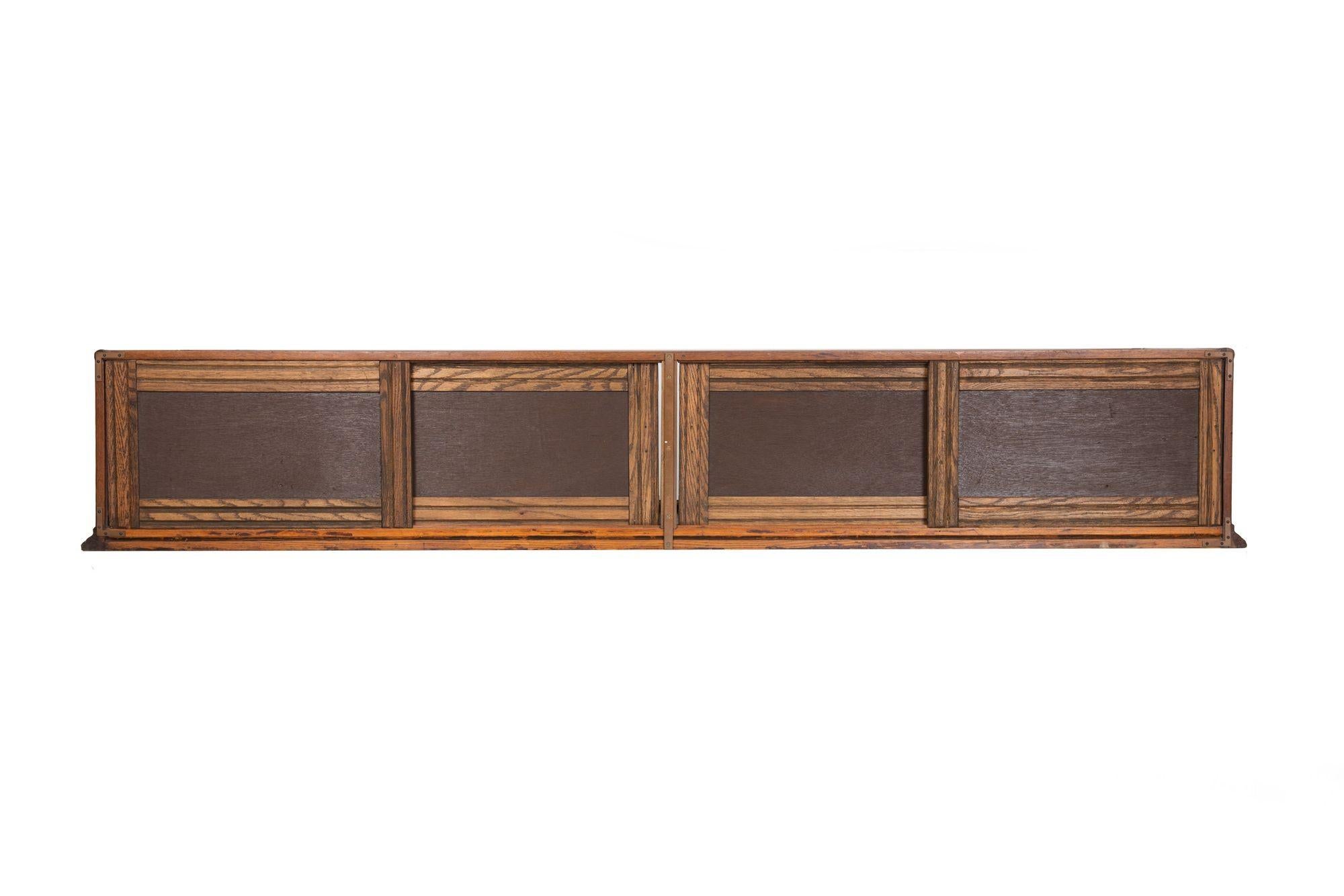 A fantastic early 20th century vintage oak, glass and brass countertop display cabinet by the Richard Sauer Manufacturing Company of Baltimore, Maryland. It remains in very good all original condition and is a fantastic addition to any vintage shop.