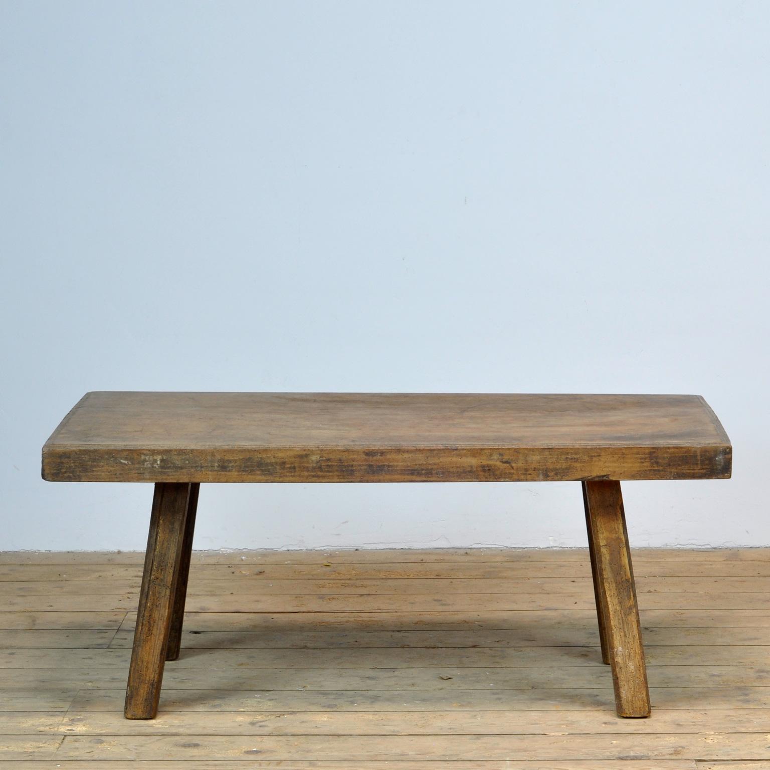 This oak butcher's farm table was produced in Hungary circa 1930s. With a nice distressed oak top of 6.5 cm thick. This piece has been wax-finished. Treated for woodworm.