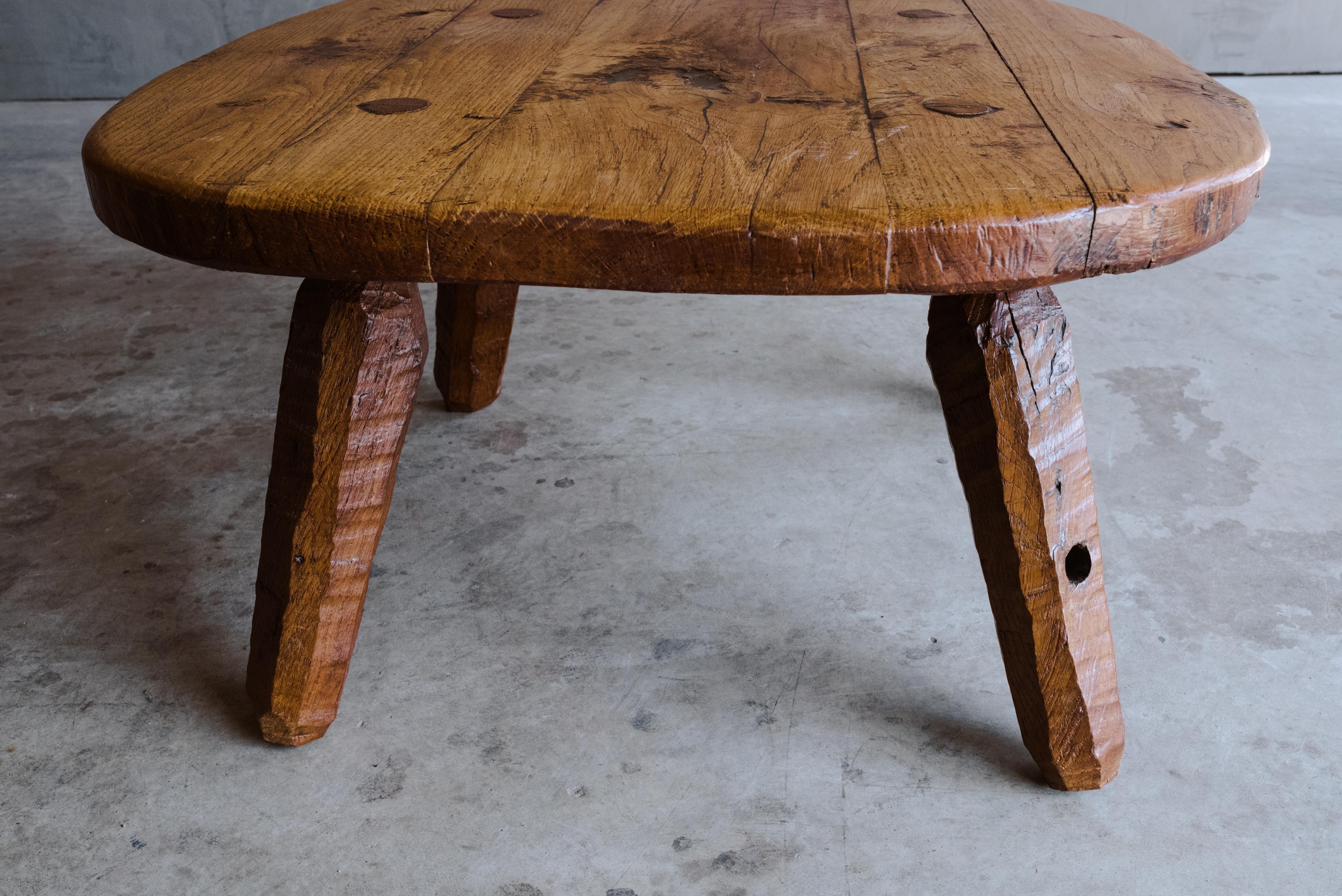 Vintage oak coffee table from France, Circa 1960. Primitive model with nice patina and wear.