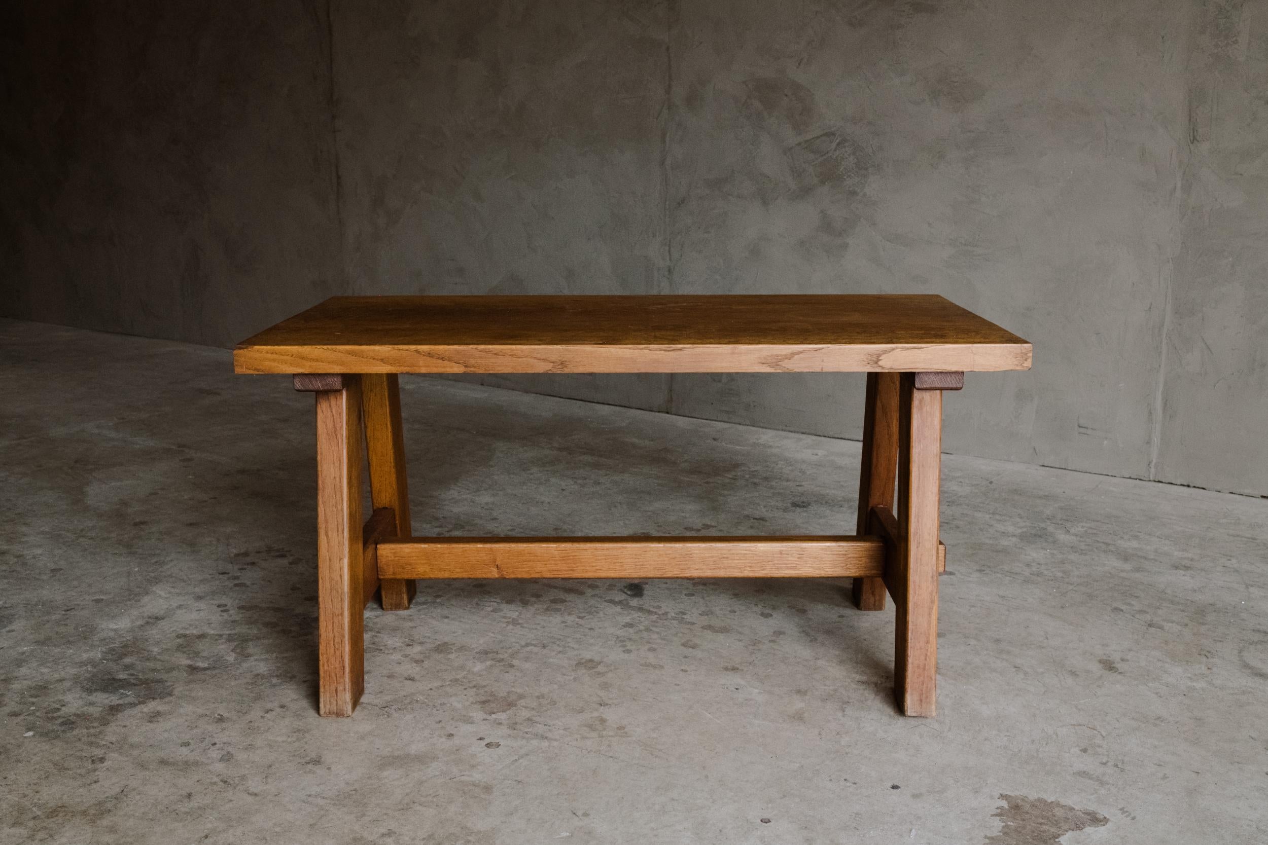 Vintage oak coffee table from France, Circa 1960. Solid oak construction with light patina and wear.