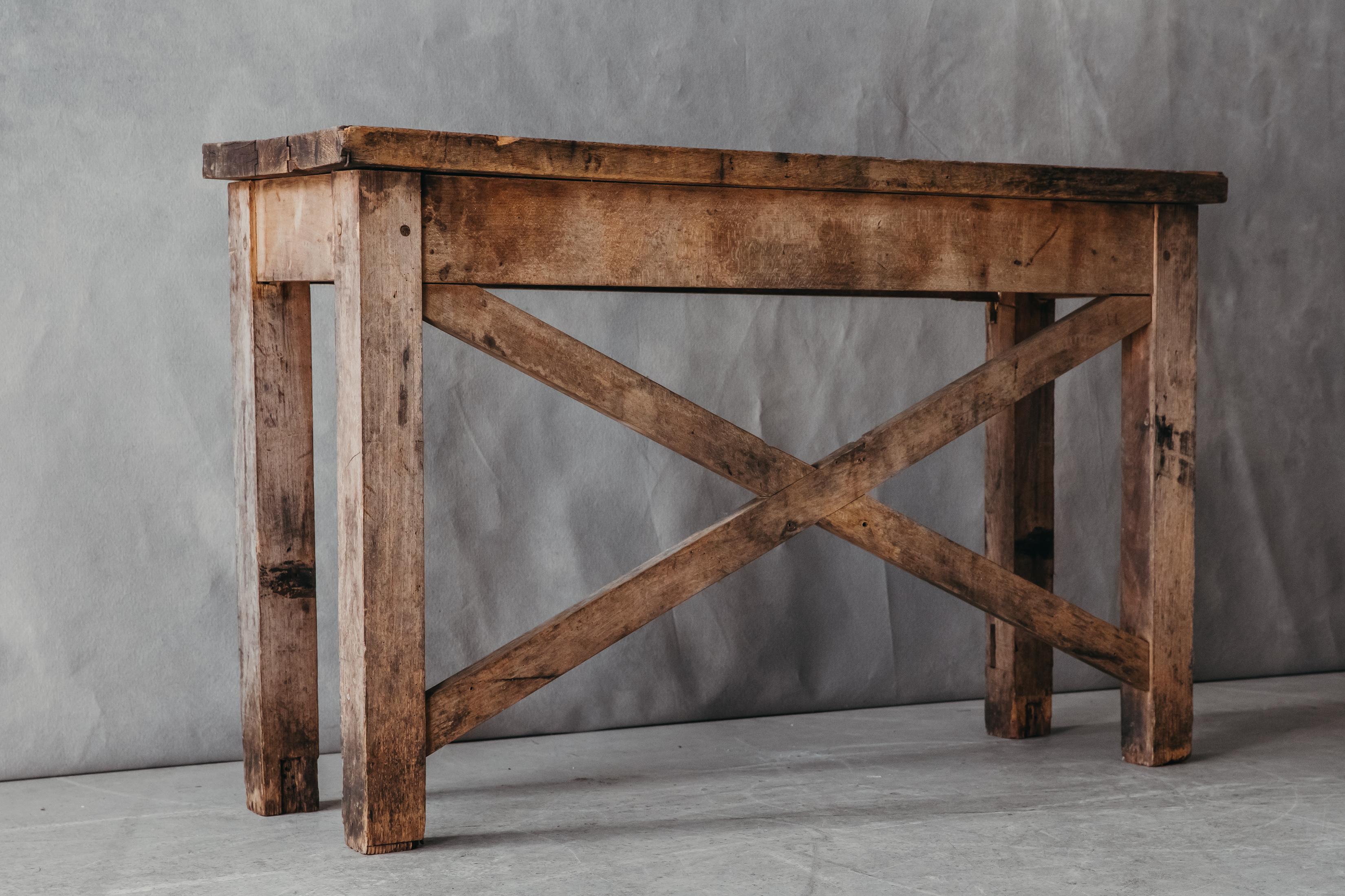 Vintage oak console from France, Circa 1950. Solid oak construction with nice patina and use. 

We don't have the time to write an extensive description on each of our pieces. We prefer to speak directly with our clients.  So, If you have any