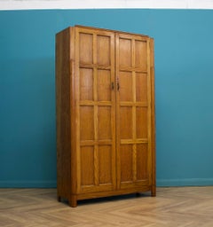 Vintage Oak Cotswold School Style Hall Cupboard from Waring Gillow, 1930s