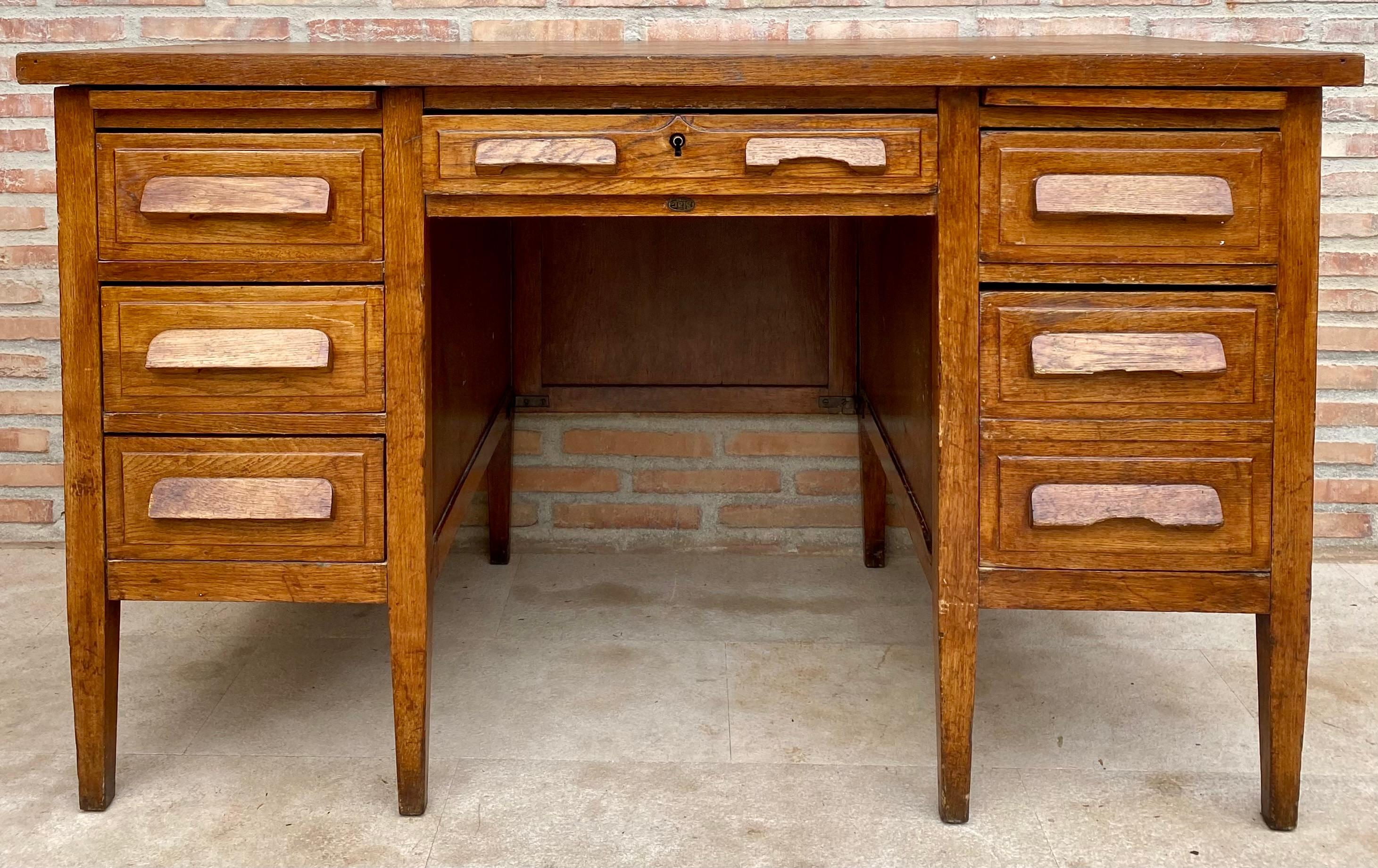 Spanish Colonial Vintage Oak Desk with Seven Drawers, 1940s For Sale