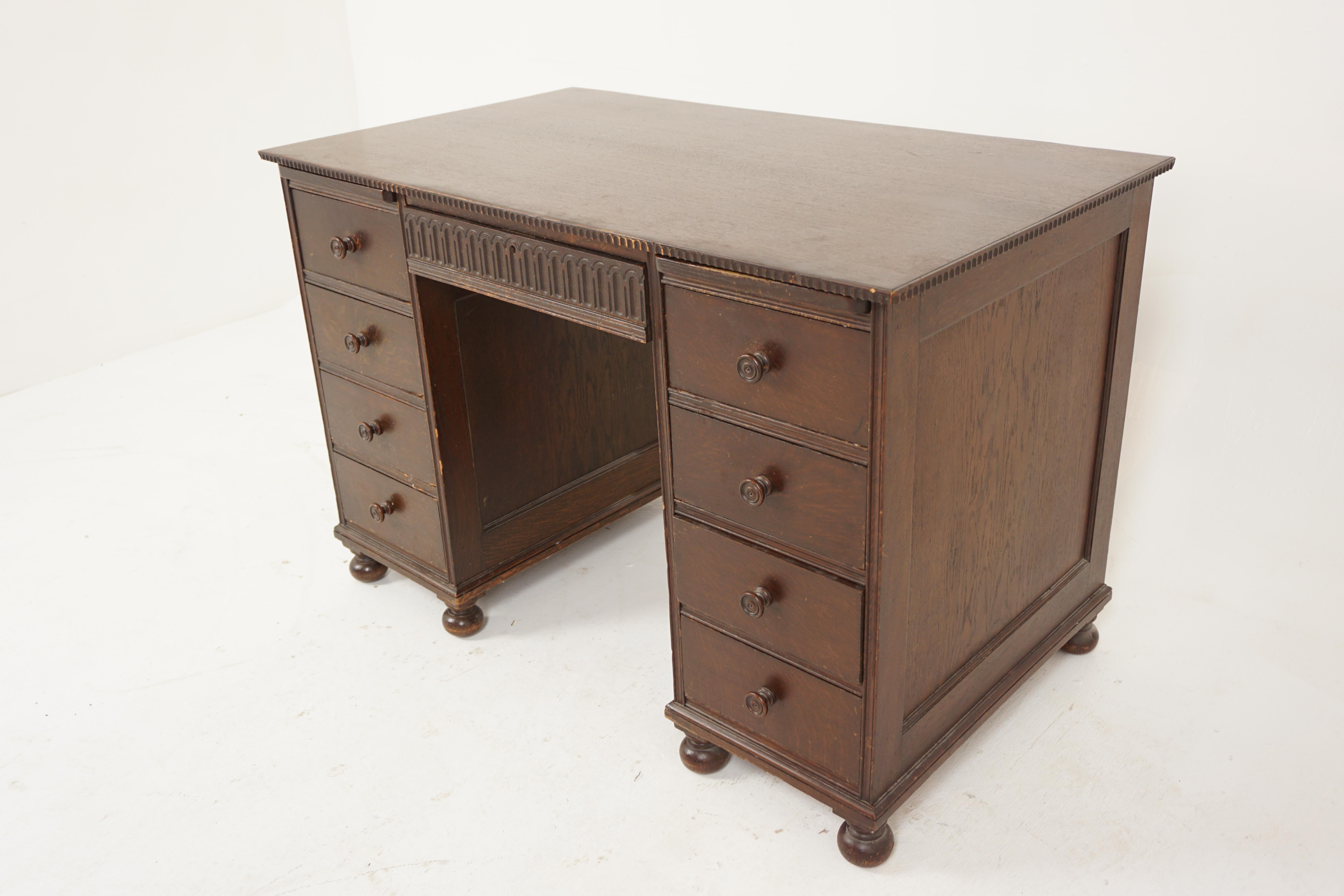 Vintage oak double pedestal desk, Scotland 1930, H350

Scotland 1930
Solid Oak
Original Finish
Rectangular Top with beaded moulding
Central drawer underneath
Flanked by pair of four drawer pedestals
All standing on bumfeet
Very clean and in good