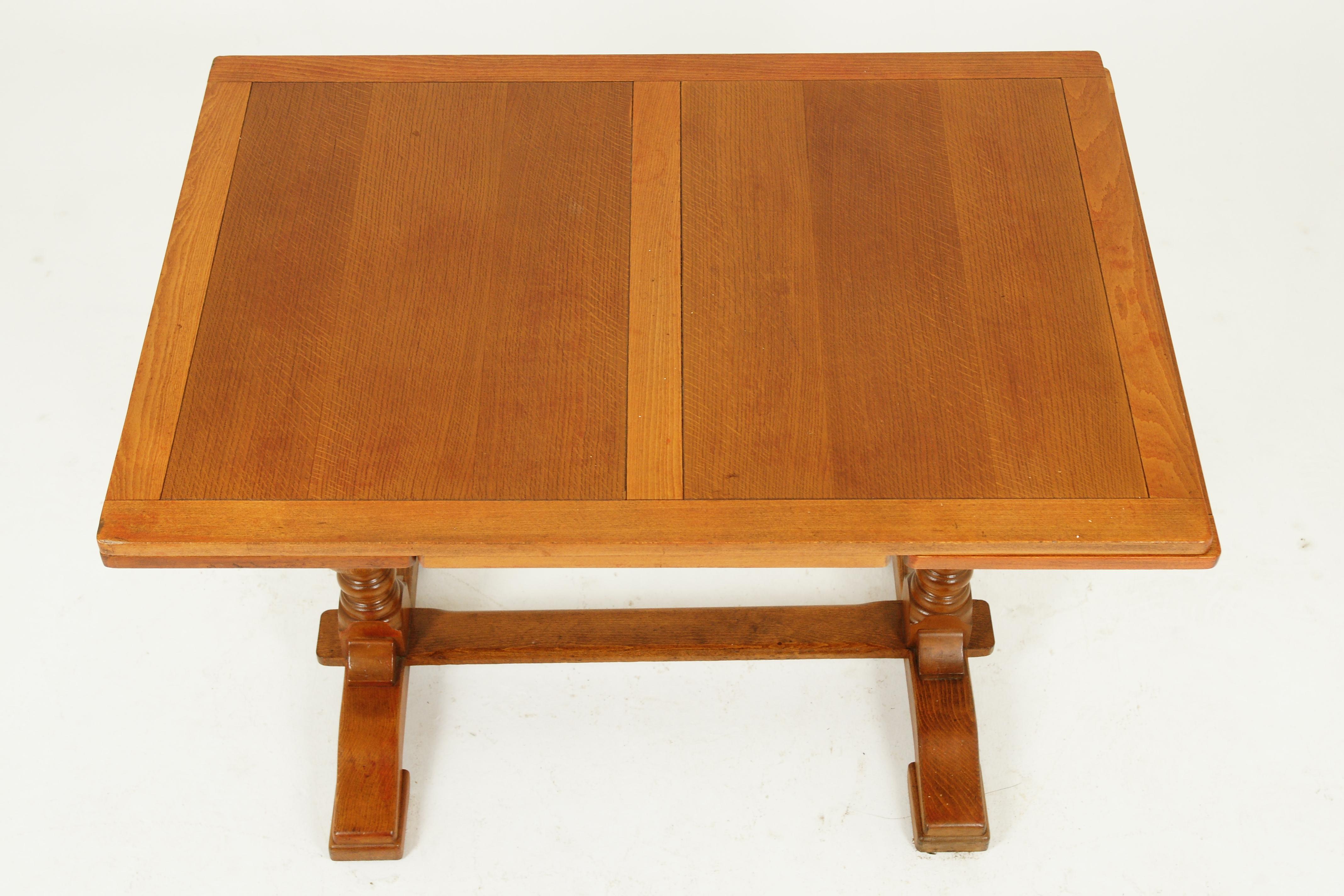 Vintage oak draw leaf, dining, refectory table, Scotland 1930

Scotland 1930
Solid oak and veneer
Table was refinished (not by us)
Rectangular top with 2 oak veneered panels
Solid oak frame
Pair of hidden leaves underneath
The leaves pull
