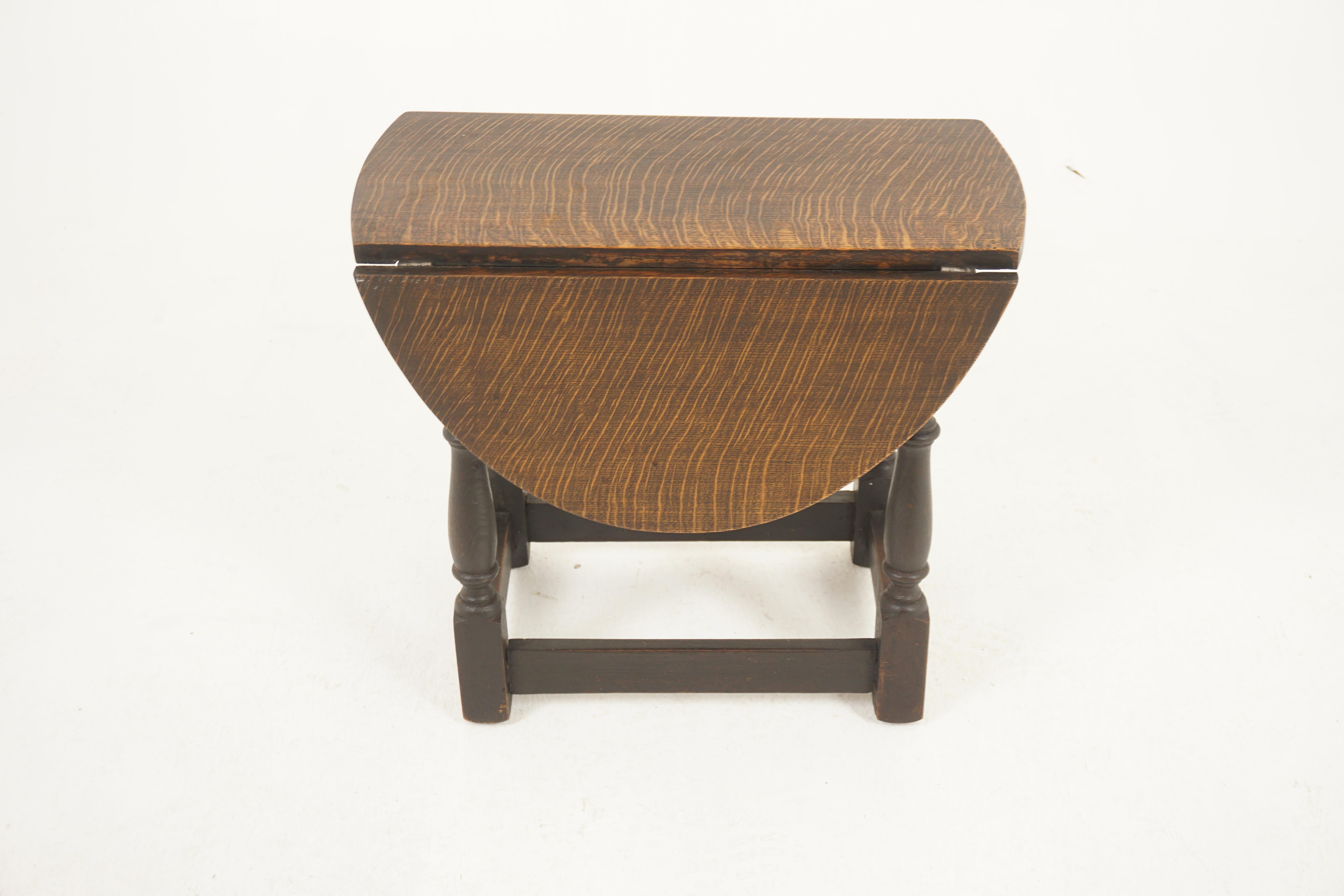 Vintage Oak Drop Leaf Table With Rotating Top, Scotland 1920, H1184

Scotland 1920
Solid Oak
Original Finish
Small proportion table slight rounded ends to to the top
Pair of half mood shaped leaves
When leaves are raised top rotates on base to