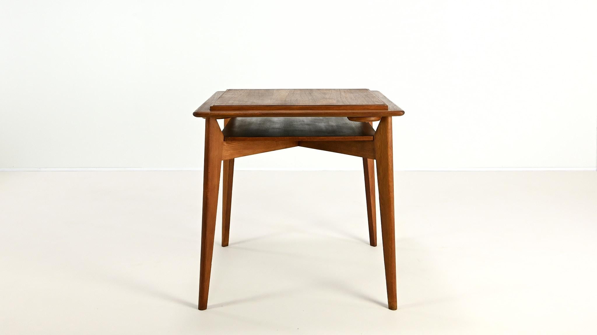 Vintage oak game table, in the manner of Roger Landault C.1950 11
