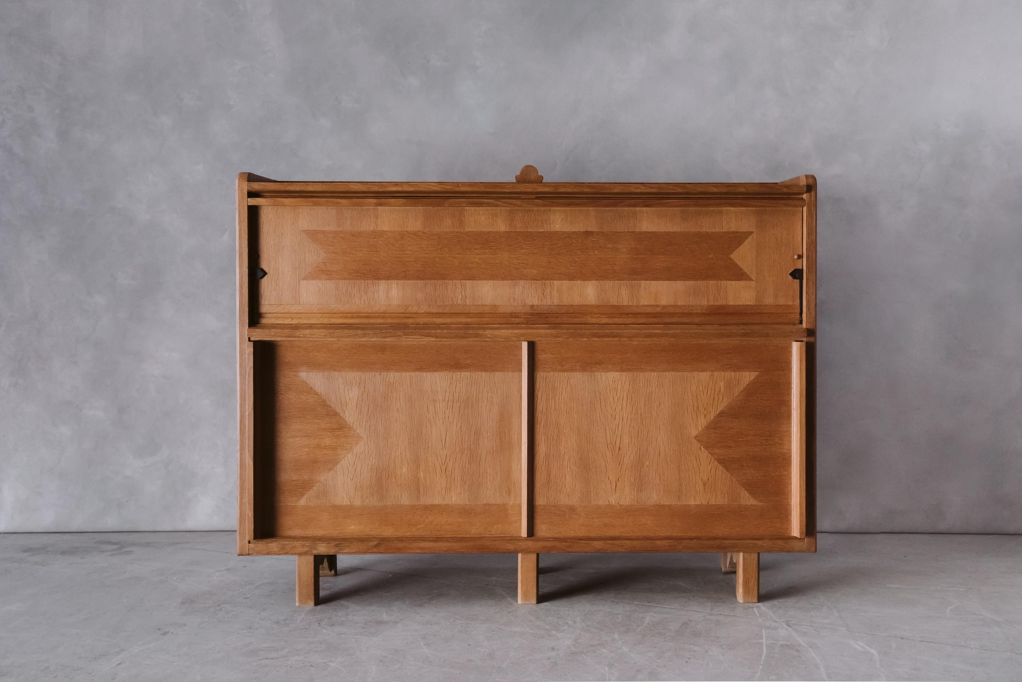 Vintage Oak Guillerme & Chambron Sideboard From France, circa 1960. High quality, solid oak construction with very light wear and use. 

We prefer to speak directly with our clients. So, If you have any questions or would like to know more please