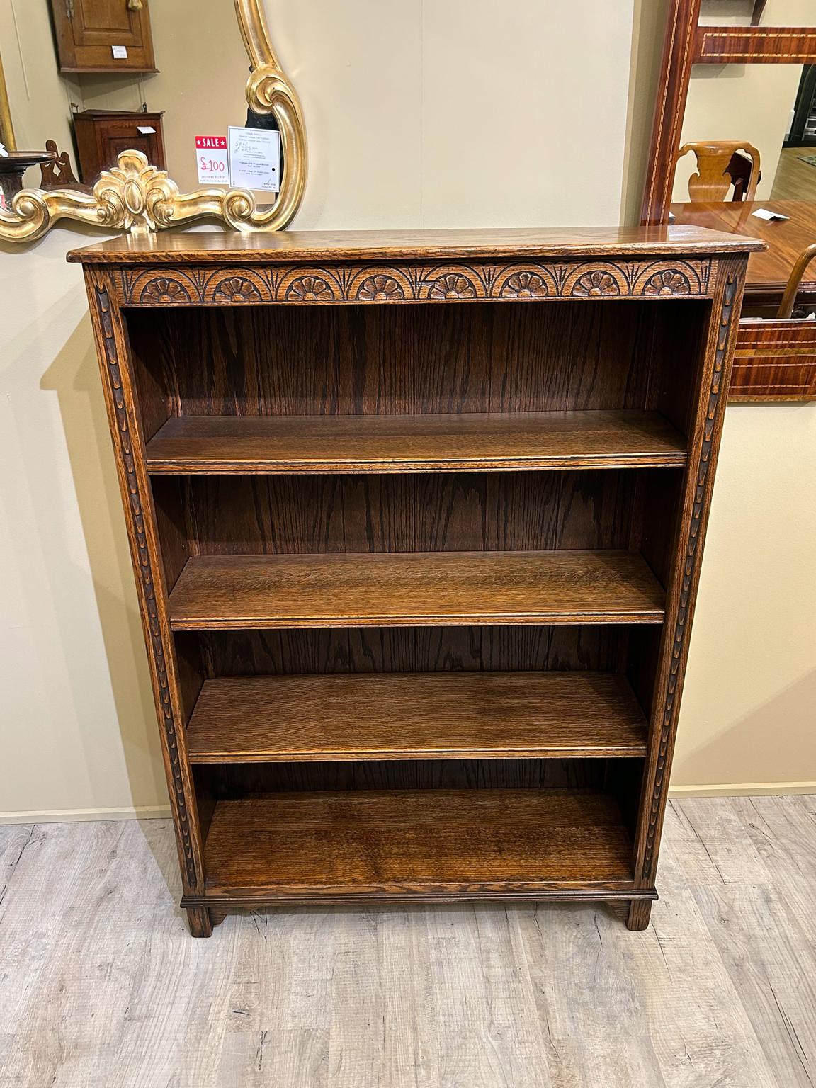 Vintage Oak Open Bookcase, fitted with three adjustable shelves on a plinth base.

Dimensions:
Height   53 inches – 135 cms
Width    39 inches – 99 cms
Depth   13 inches –  34 cms

Reference: BC2302