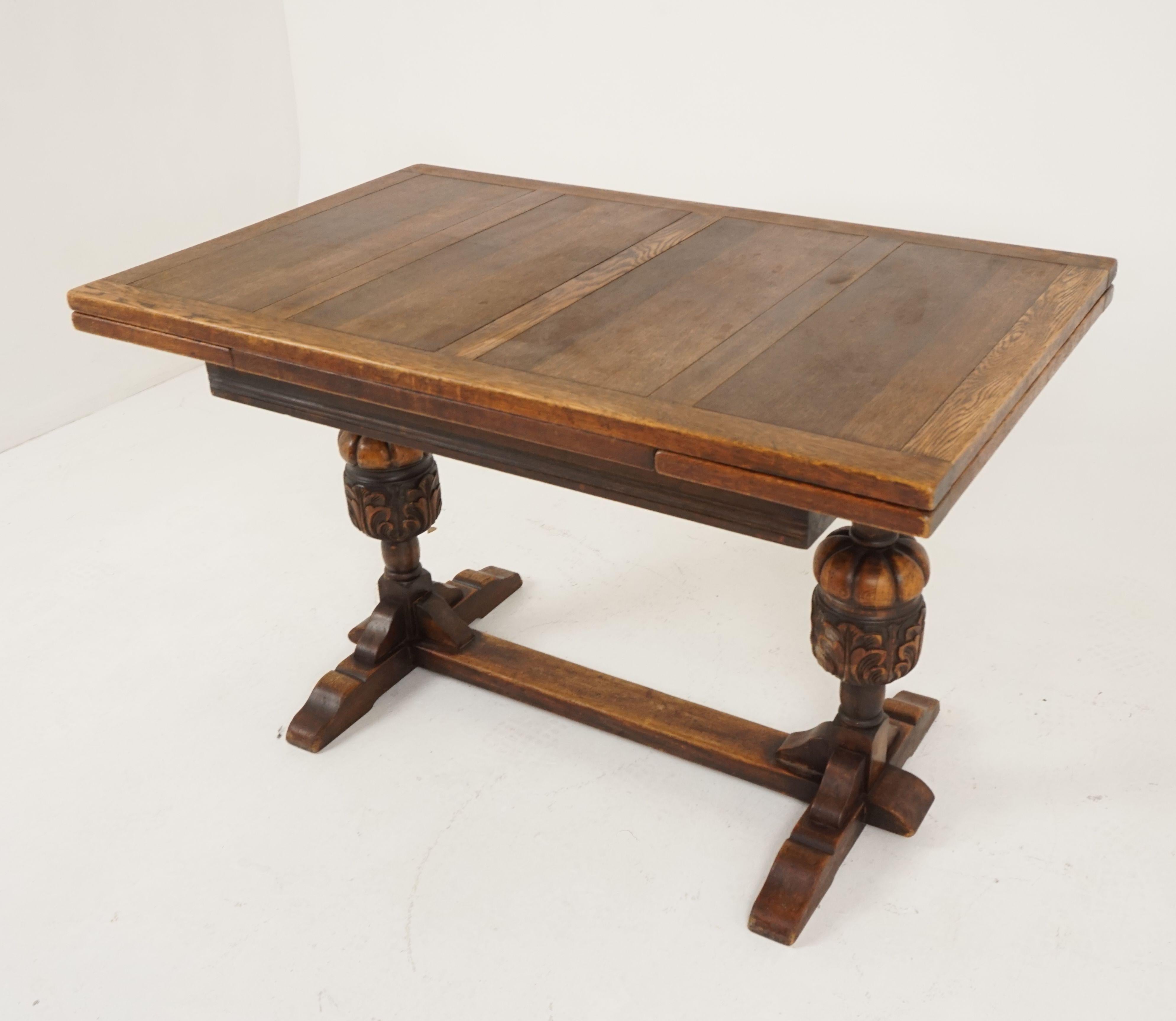 Vintage oak refectory table, draw leaf, writing table, Scotland, 1930

Scotland, 1930
Solid oak and veneers
Original finish
Rectangular top with four oak veneered panels
Solid oak frame
Pair of hidden leaves underneath
These leaves pullout