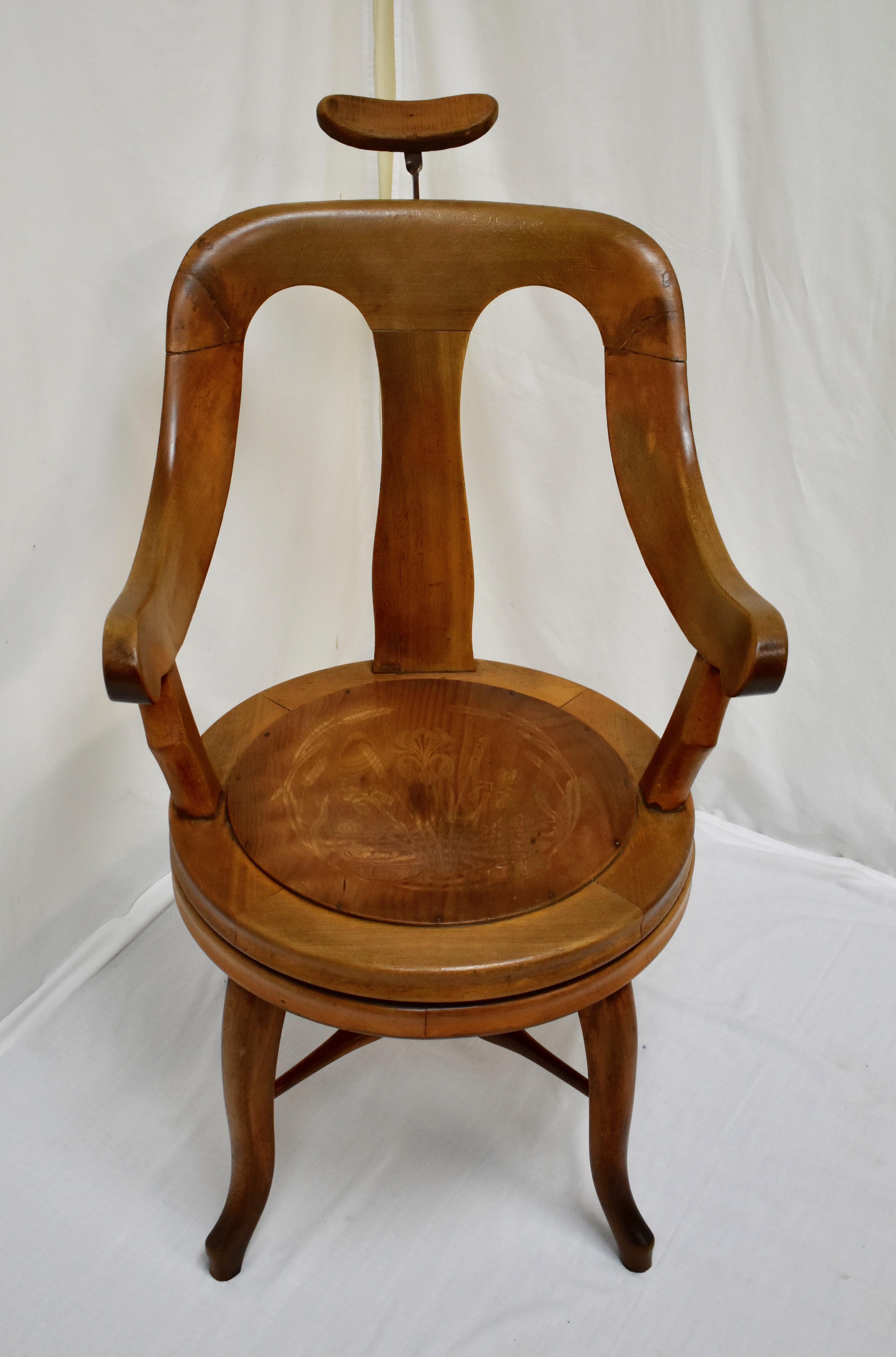 This is a magnificent curvilinear oak barber’s chair with a swivel seat and an adjustable headrest, supplied by Dreszmann Karoly (Charles Dreszmann) of Budapest around 1920. Dreszmann’’s iconic company supplied hairdresser’s and barber’s equipment