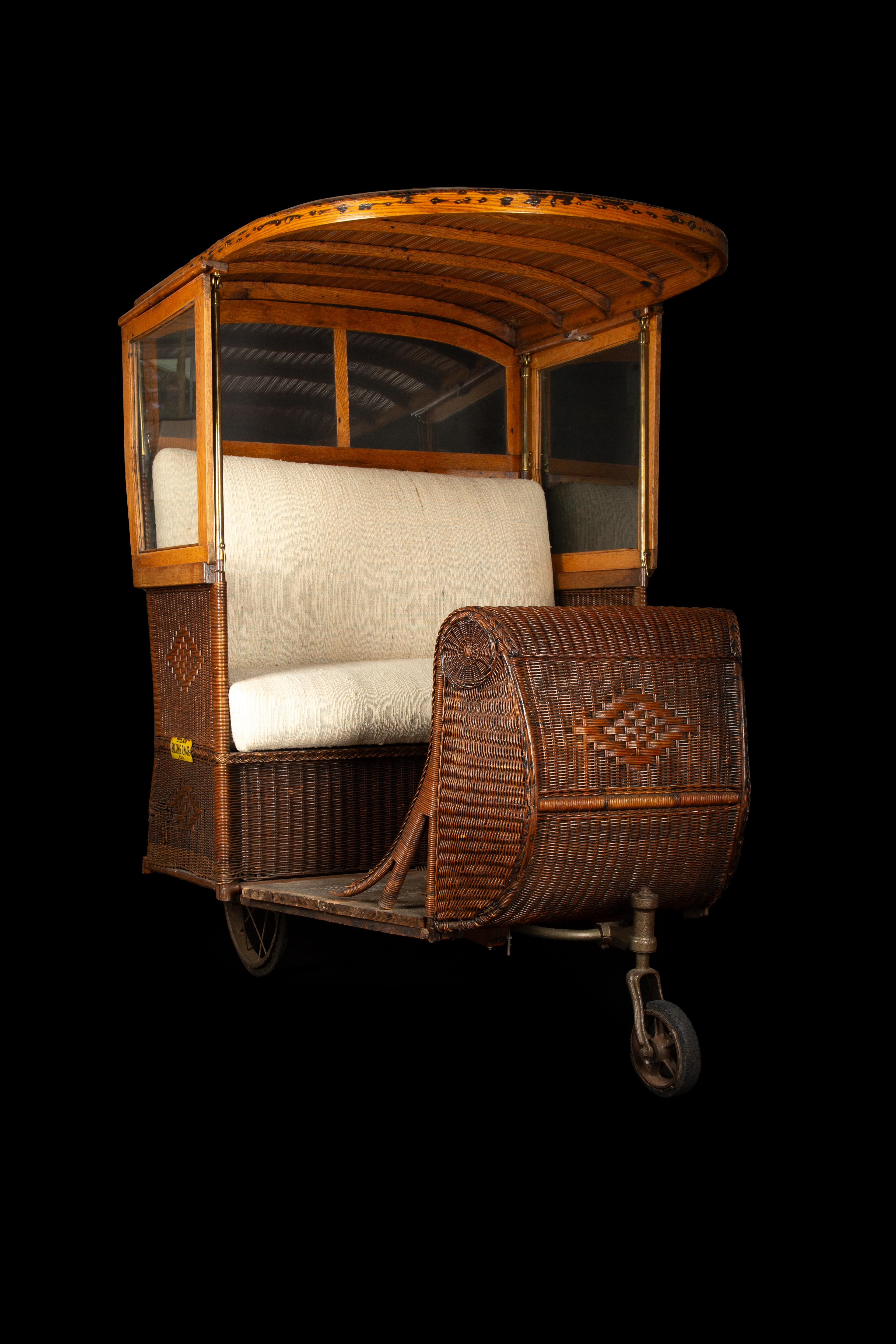 Step back in time with this fun Early 20th Century Wicker Boardwalk rolling cart crafted by the renowned 