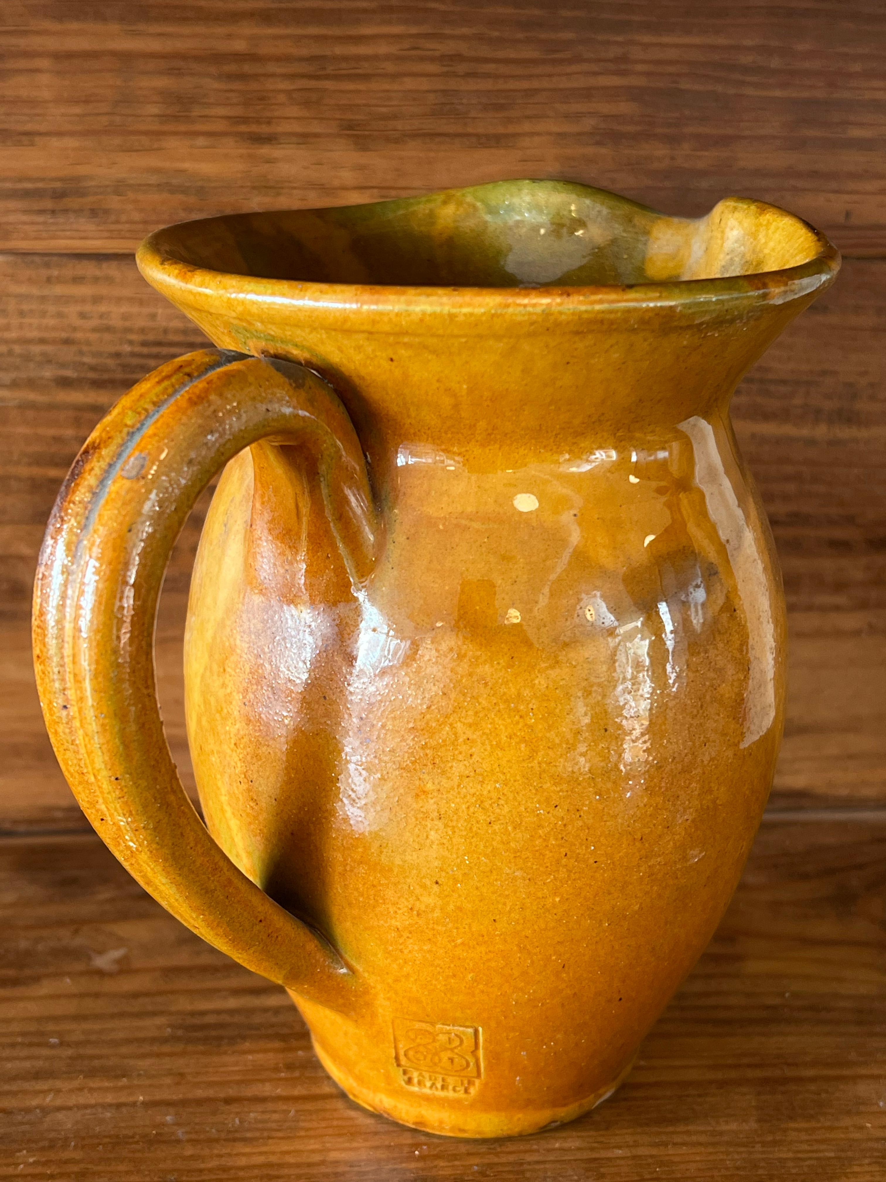 French Vintage ochre-coloured pitcher from the Biot factory in Provence, France For Sale