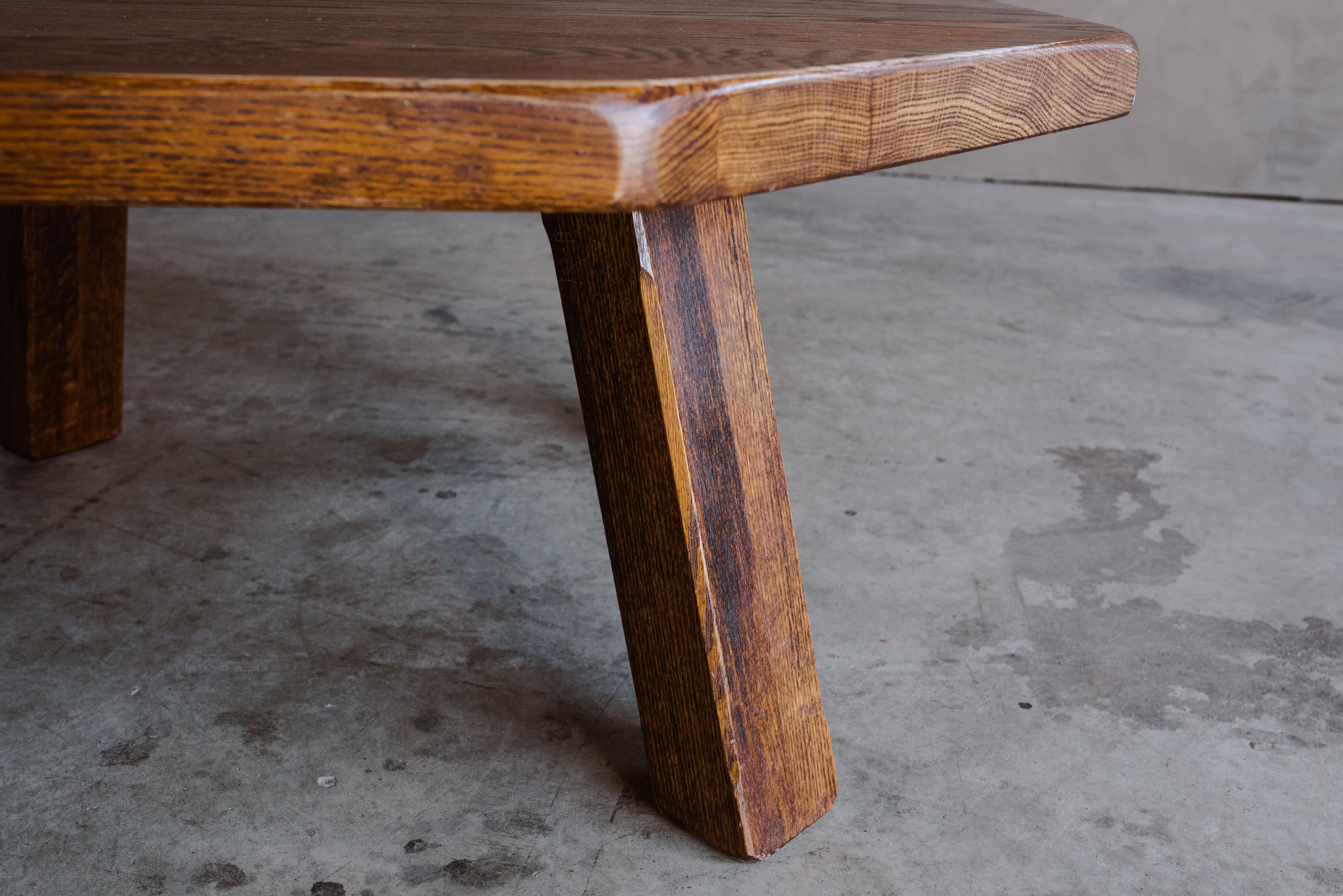 Vintage octagonal oak coffee table from France, Circa 1960. Solid oak construction with very light wear and use.